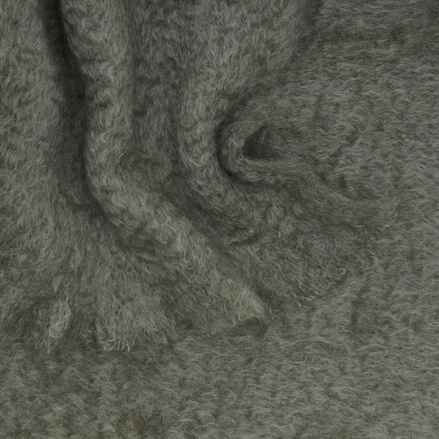 Solid Mohair Pillow in olive.