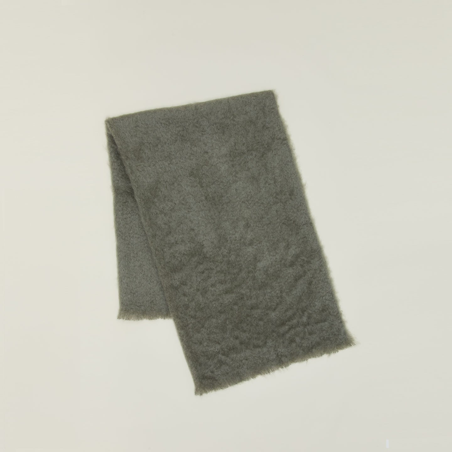 Solid Mohair Pillow in olive.