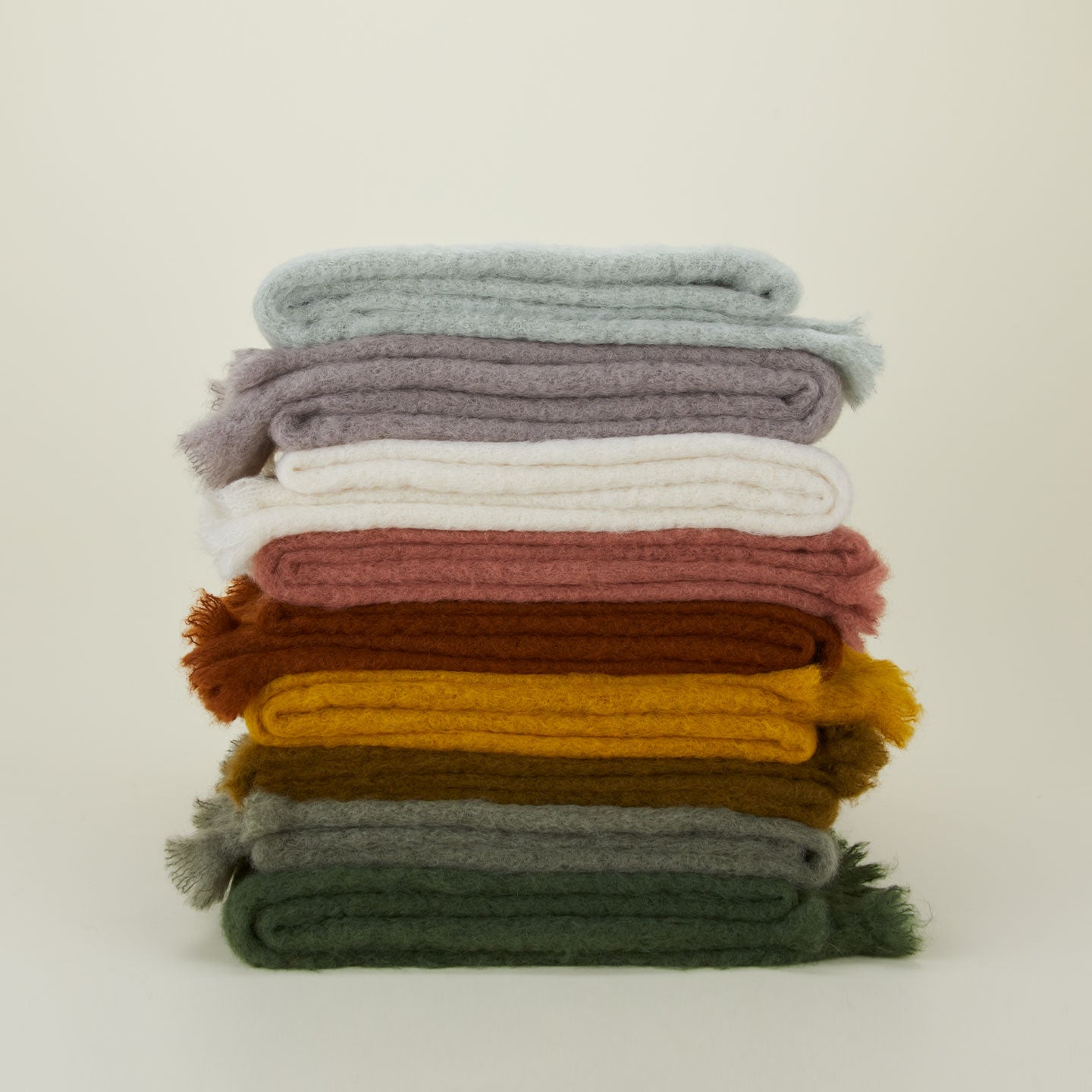 Solid Mohair Pillow in olive.