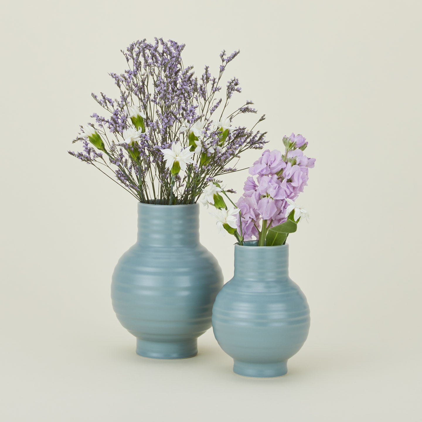 Essential Ceramic Vase in Sky in Small and Large sizes with flowers.