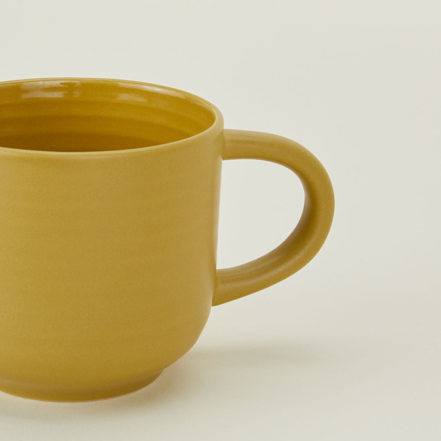 Close up of Essential Mug in Mustard.
