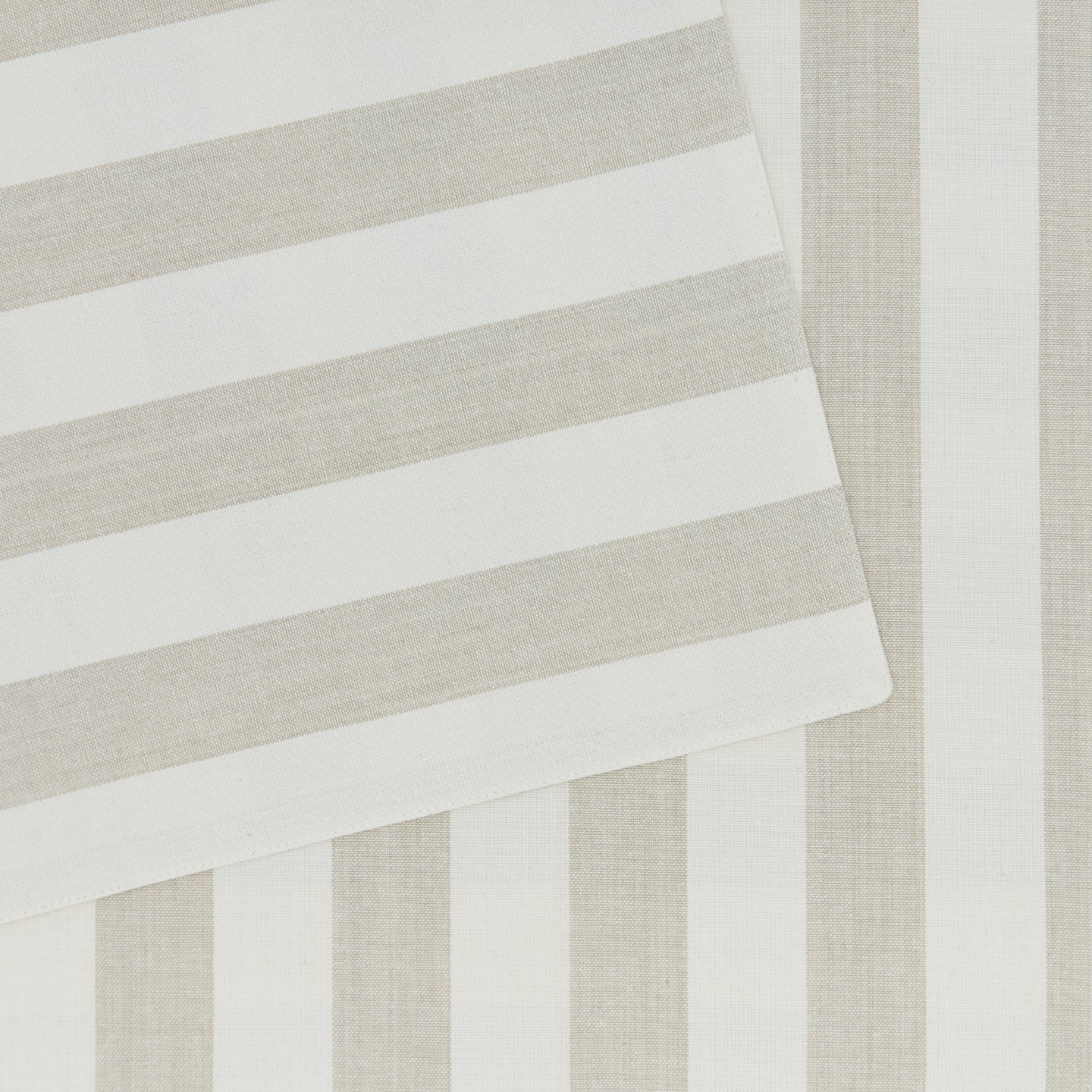 Close up of Essential Striped Placemat in Ivory and Flax.