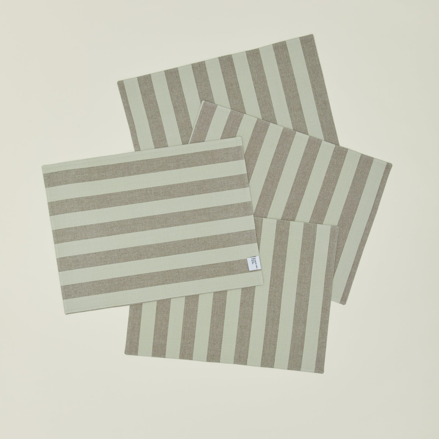 Set of four Essential Striped Placemats in Olive and Sage.
