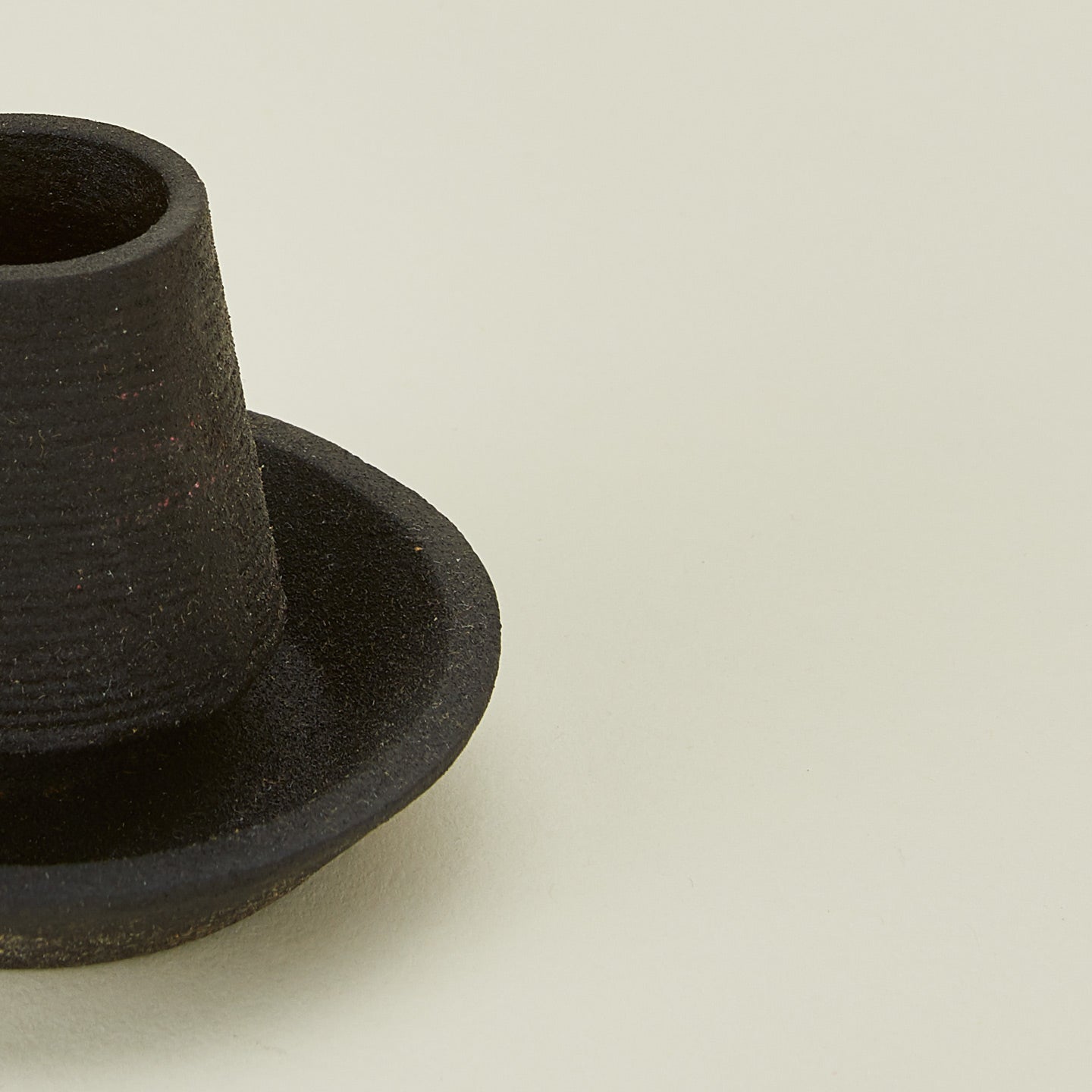 Close up view of Areaware cast iron matchstriker