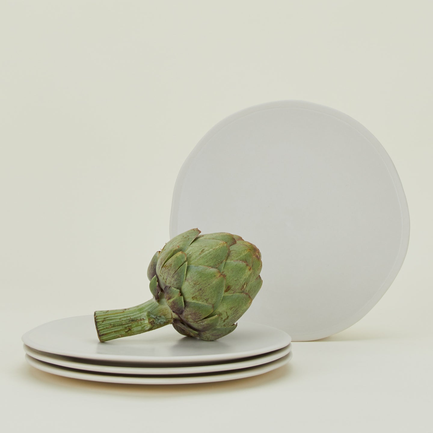 Four Atelier Dinner Plates, with green beans.