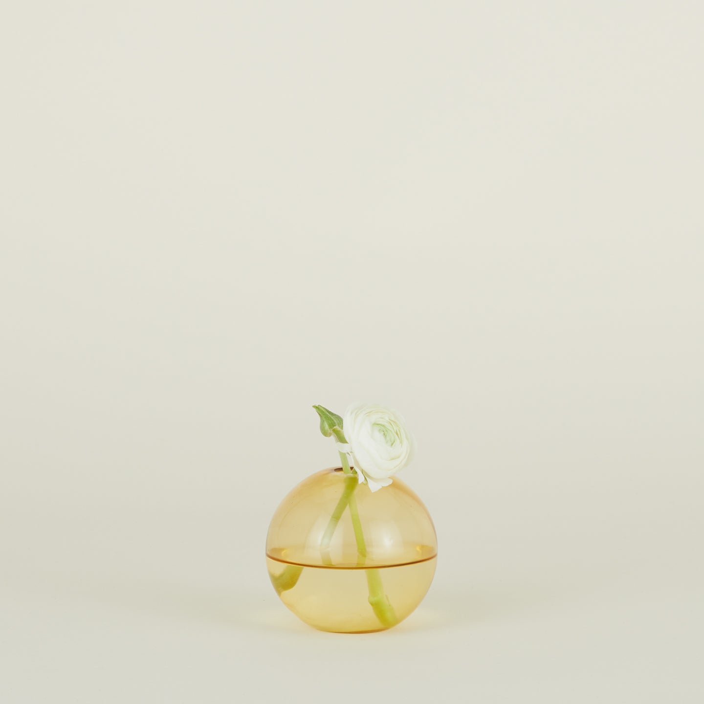 Small aurora sphere vase in amber with florals
