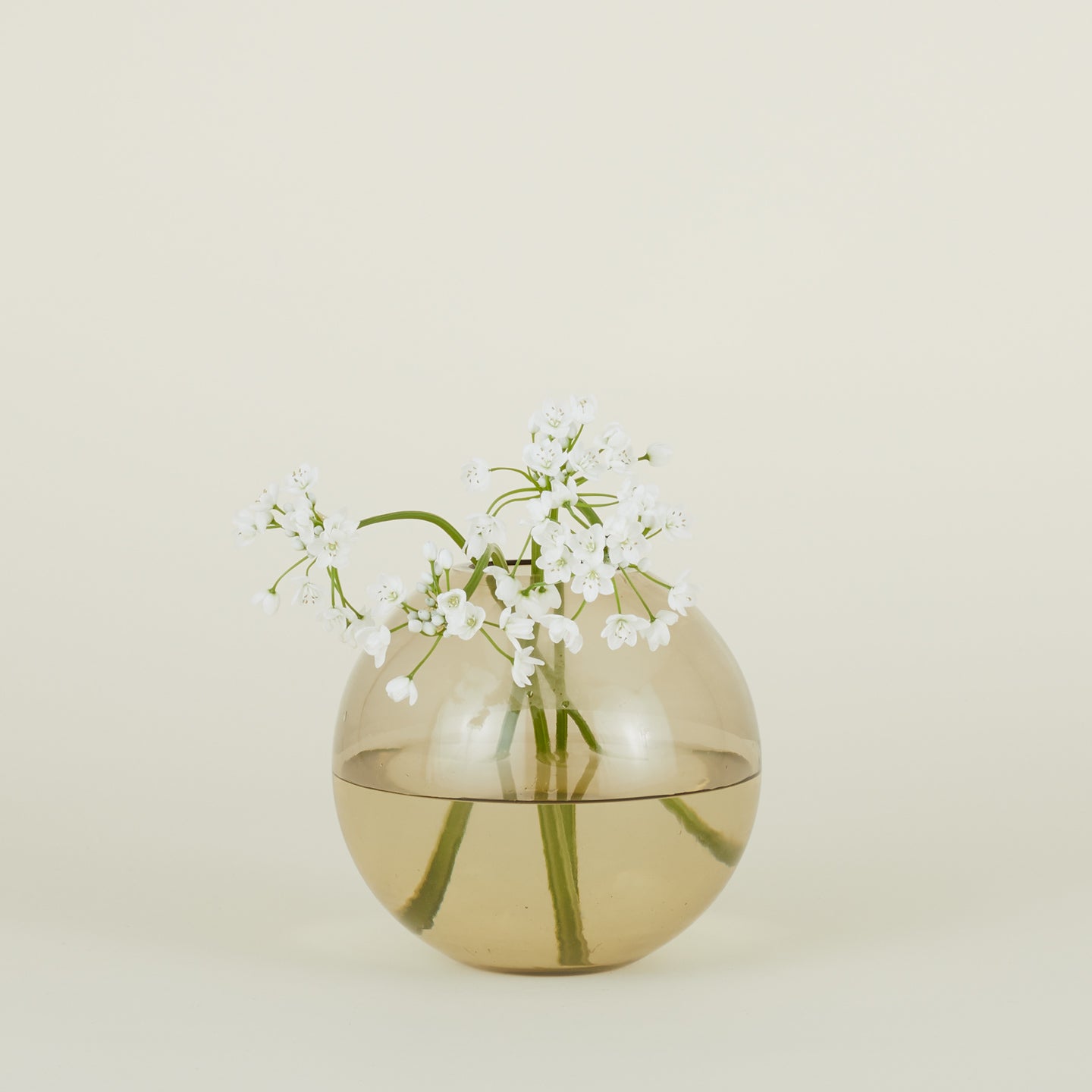 Large aurora sphere vase in smoke with florals