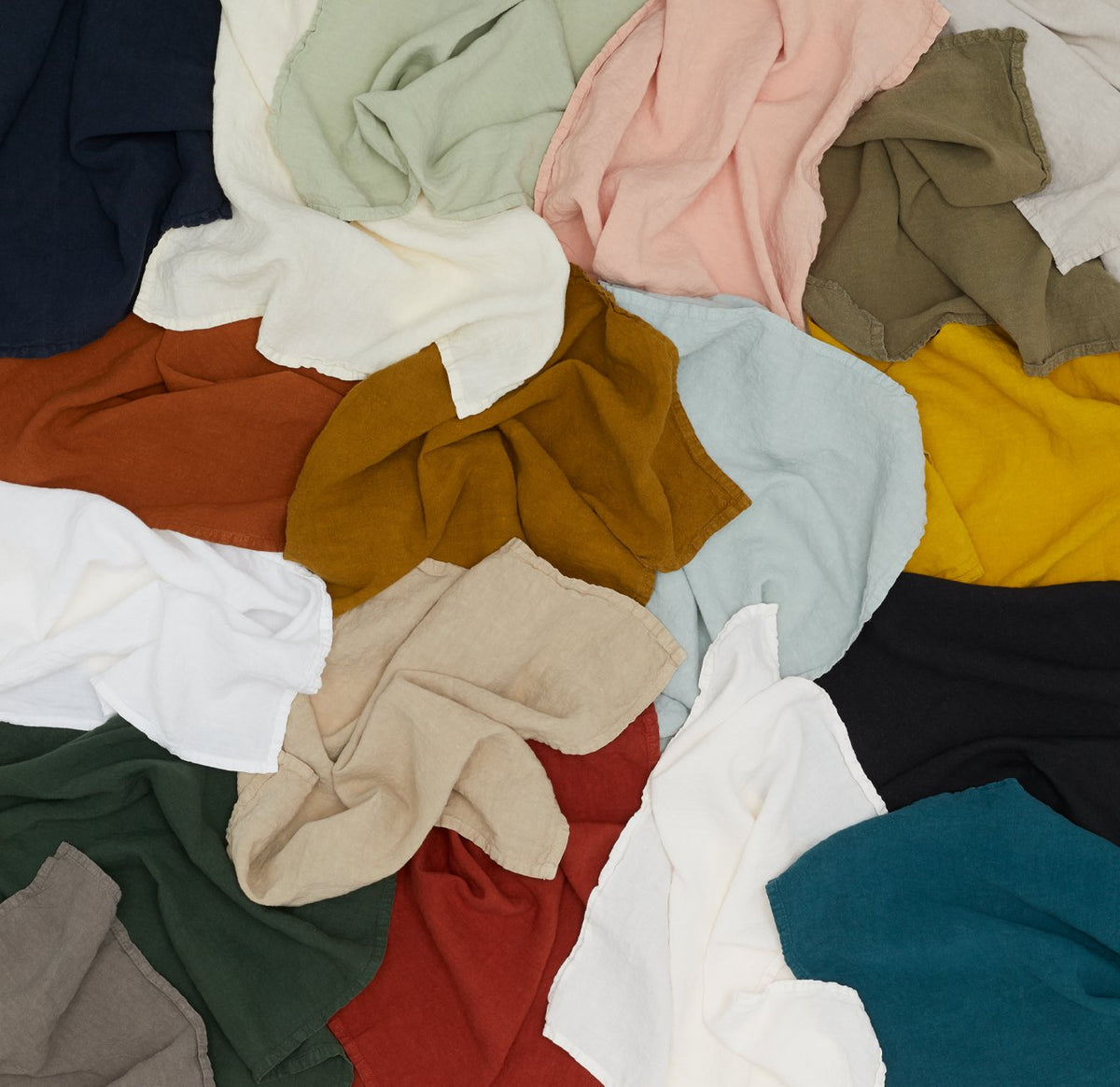 Overhead of 18 colors of HNY linen