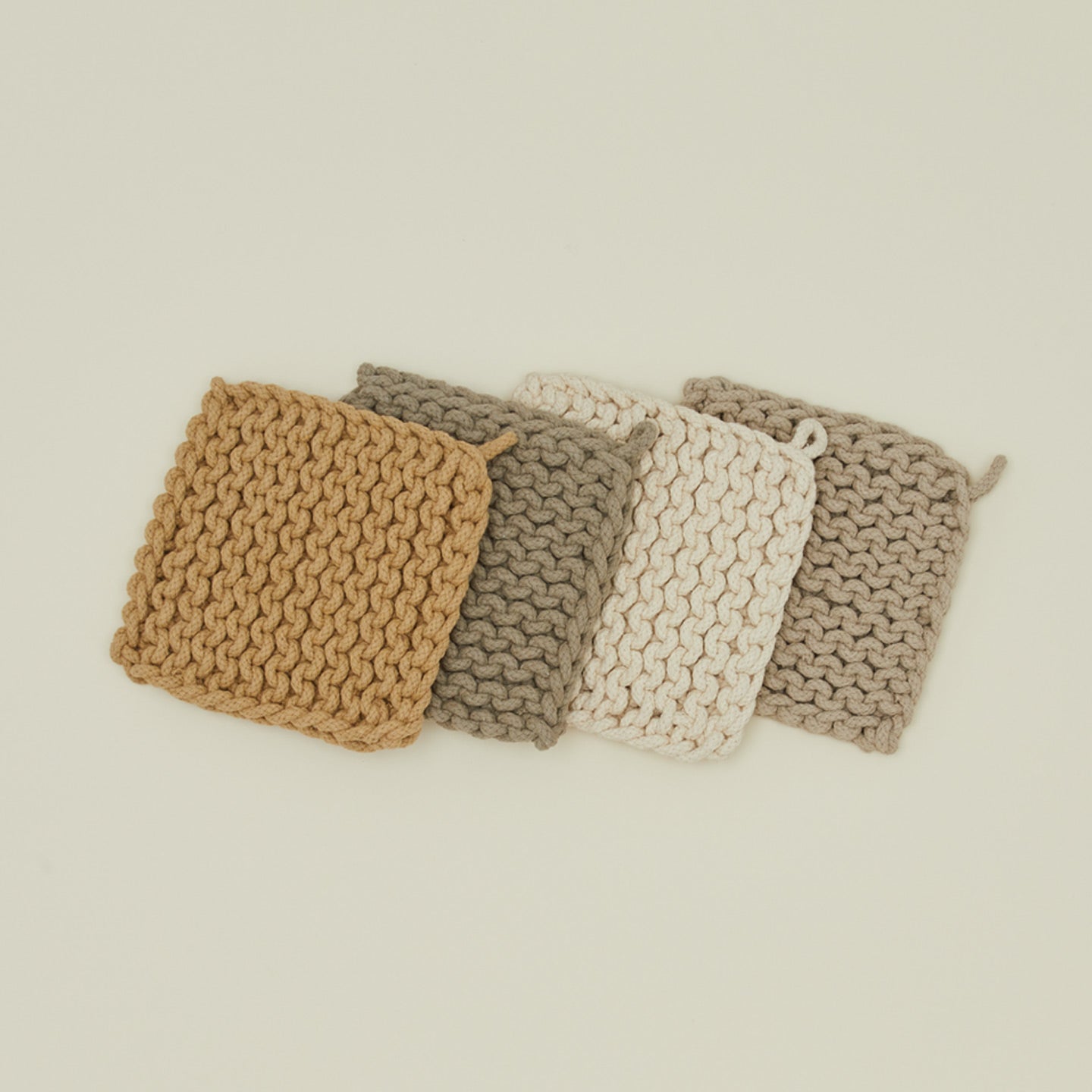 Crocheted pot holders in natural colors