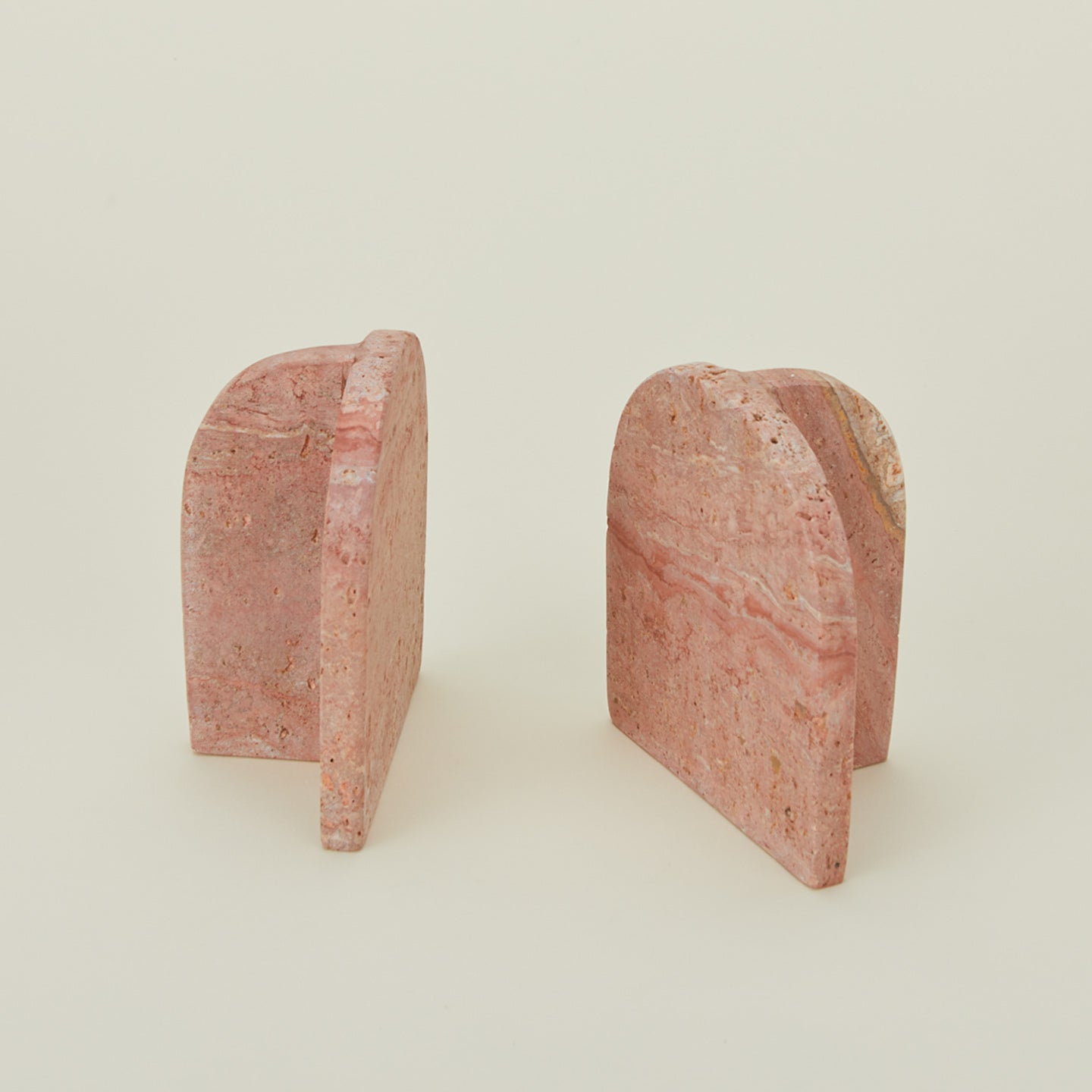 Red travertine book ends