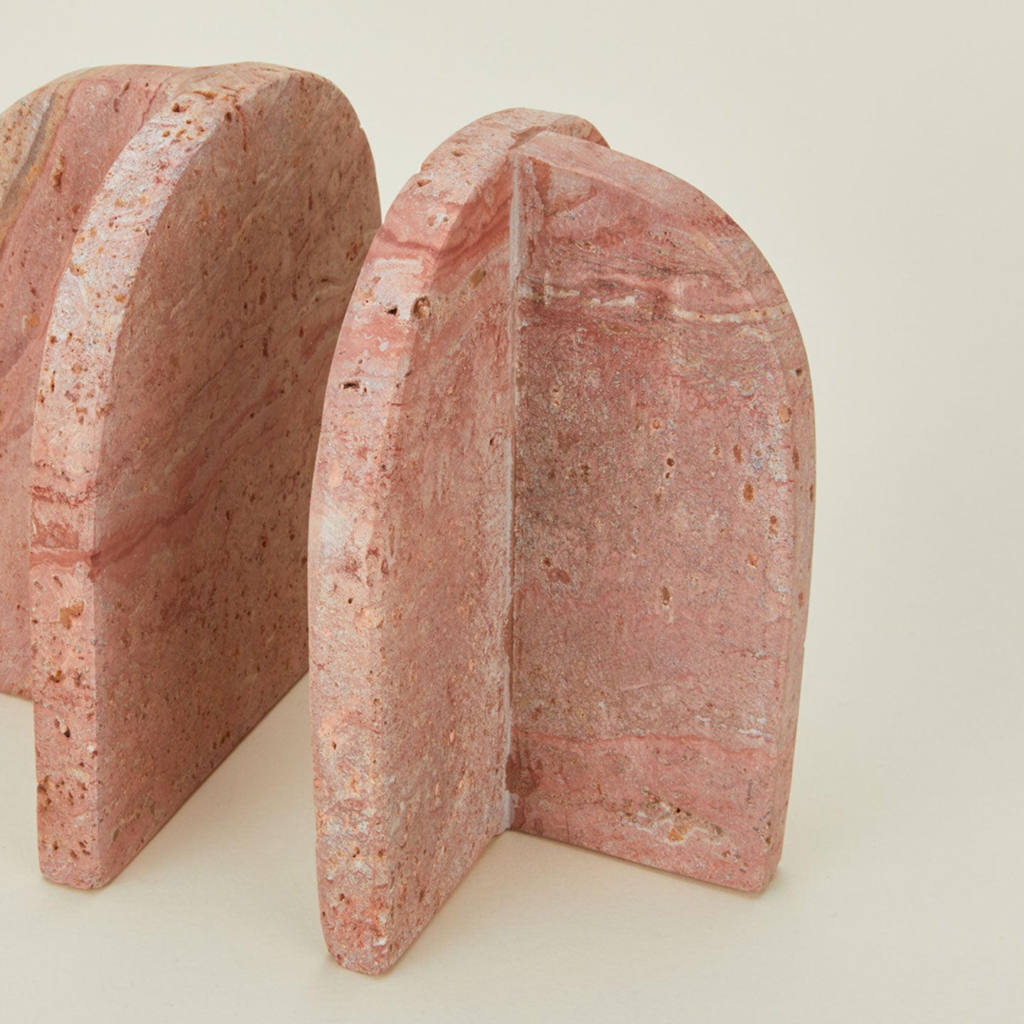 Close up view of red travertine book ends