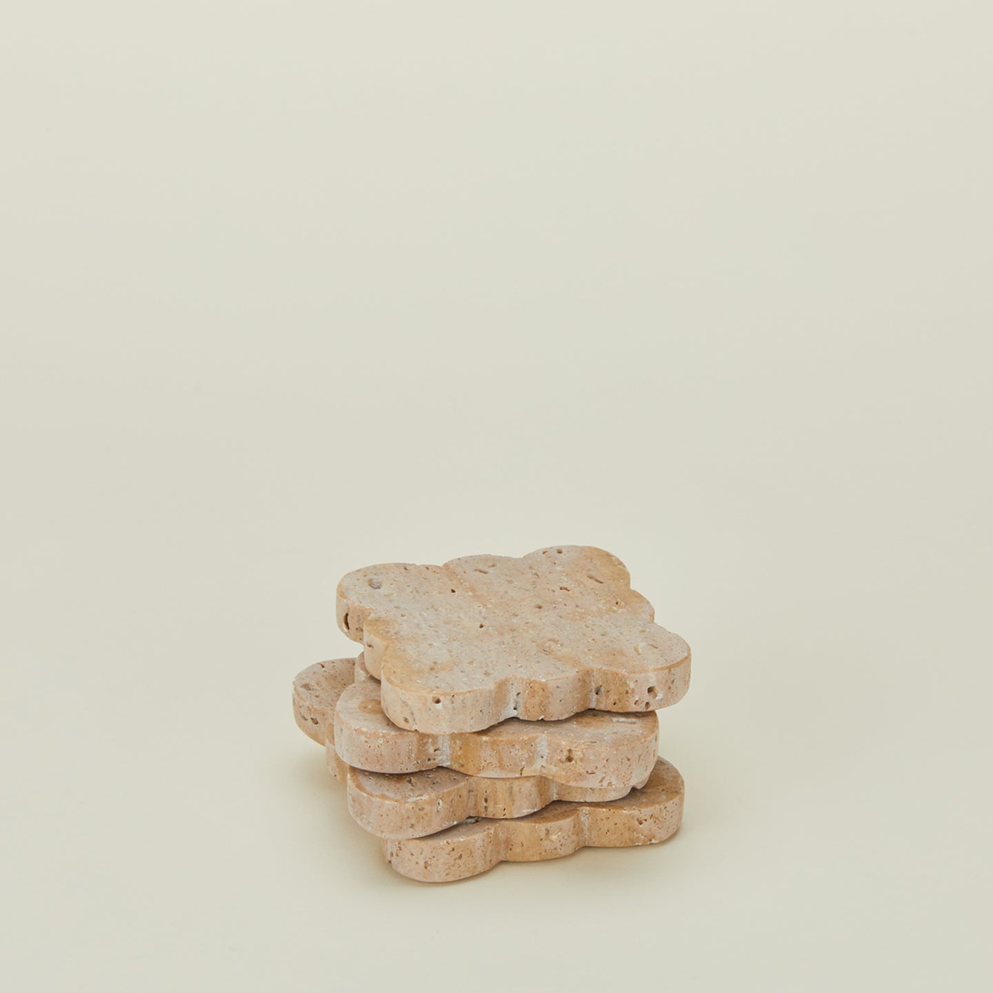 Stacked travertine scalloped coasters