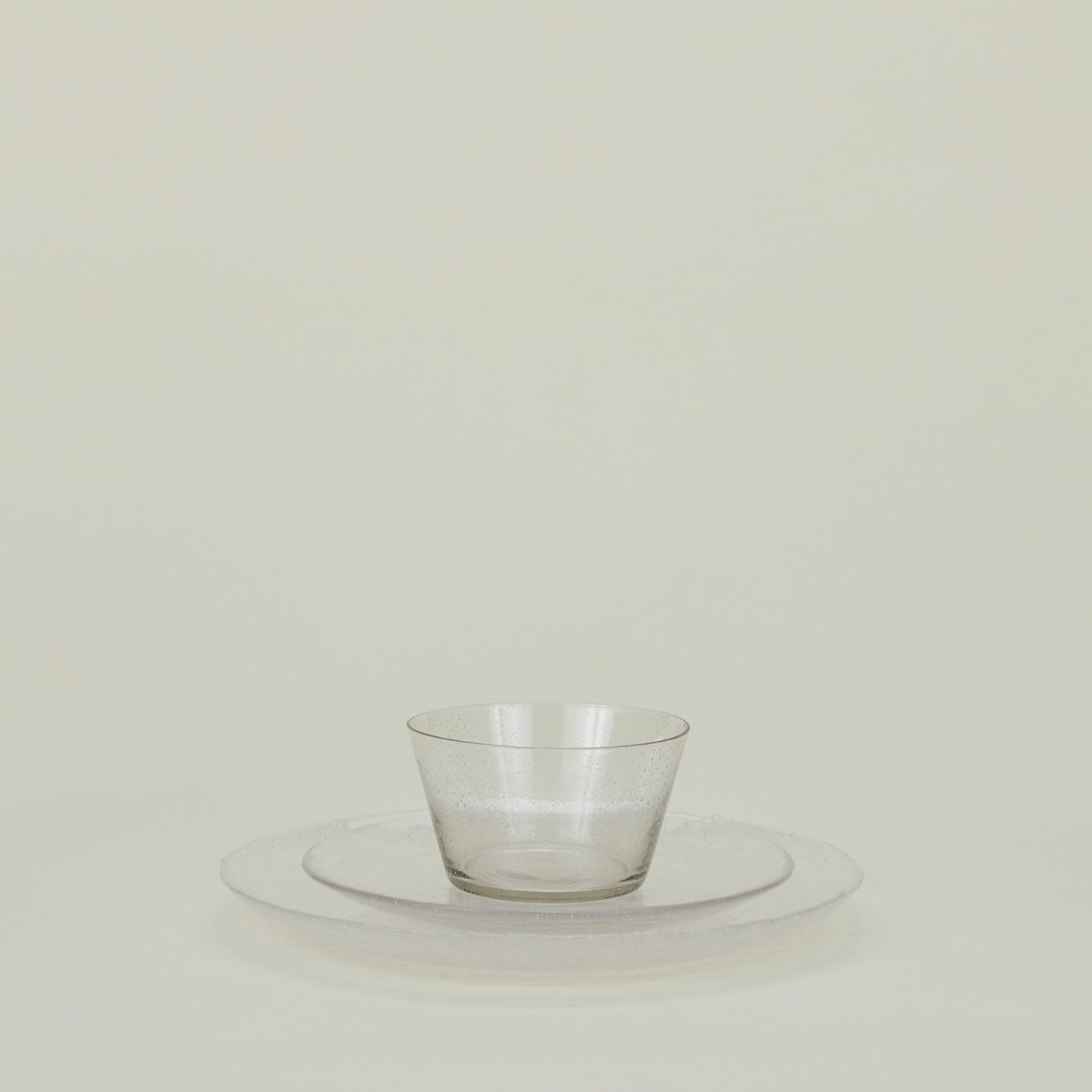 Group of Clear glass dinner plate, salad plate and bowl.