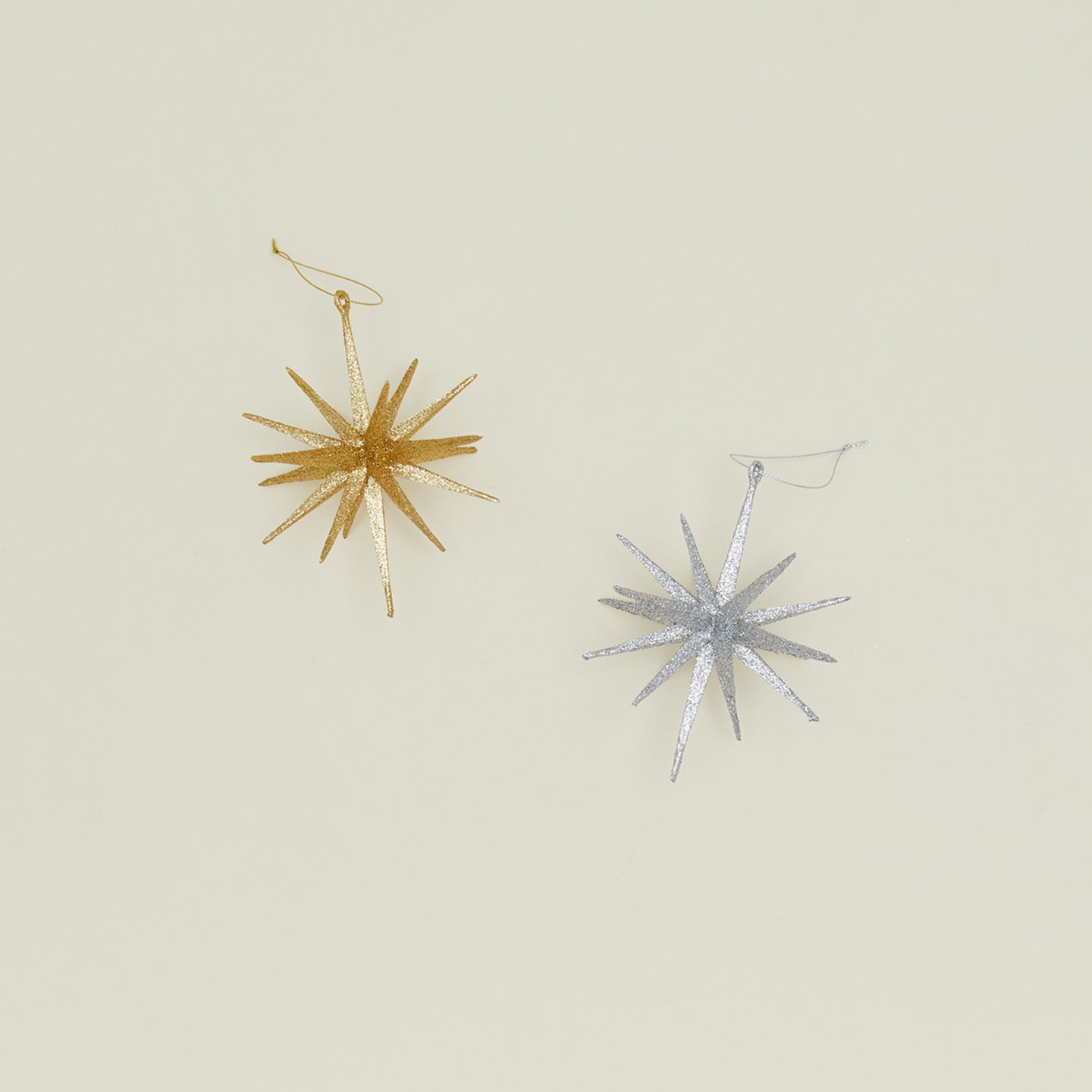 Gold and silver glitter starburst ornament