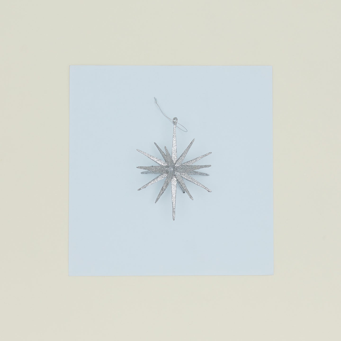 Silver starburst glitter ornament large