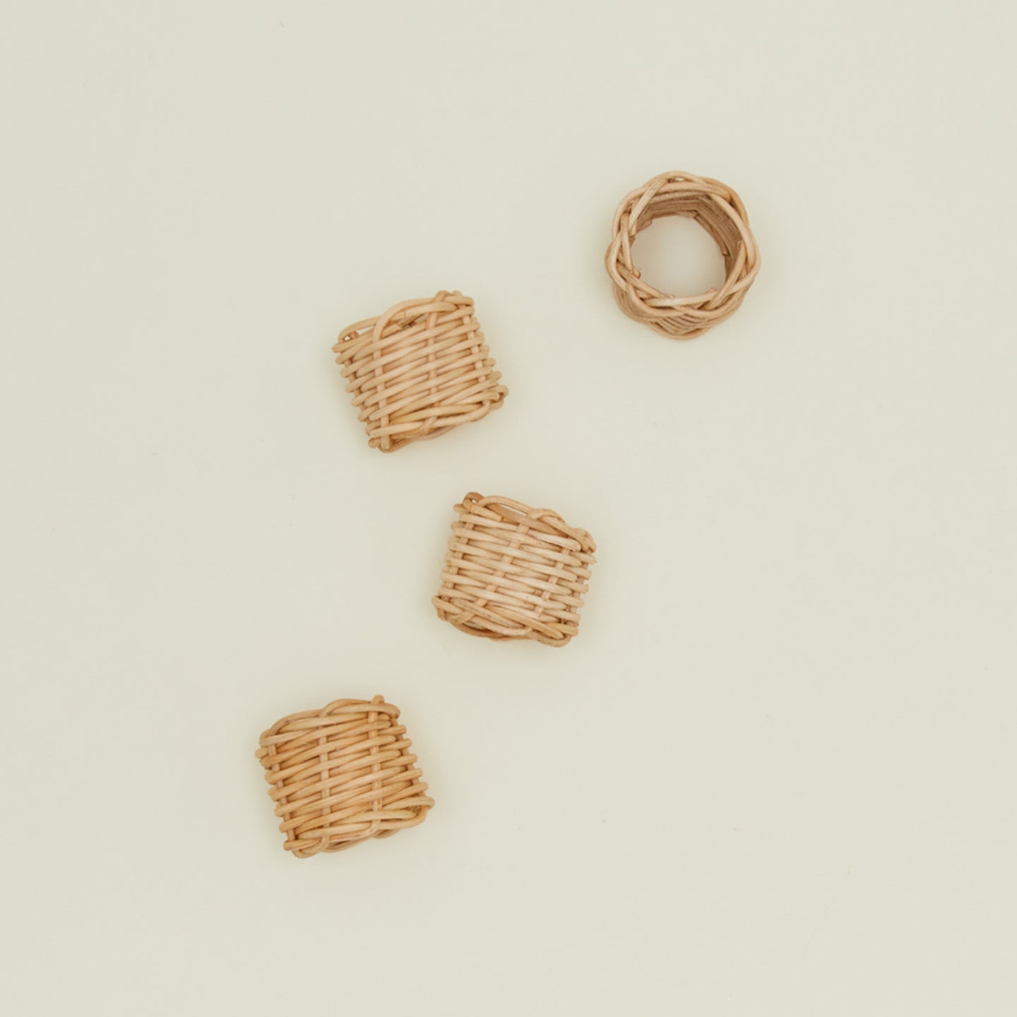 Overhead view of basket weave napkin rings set of 4