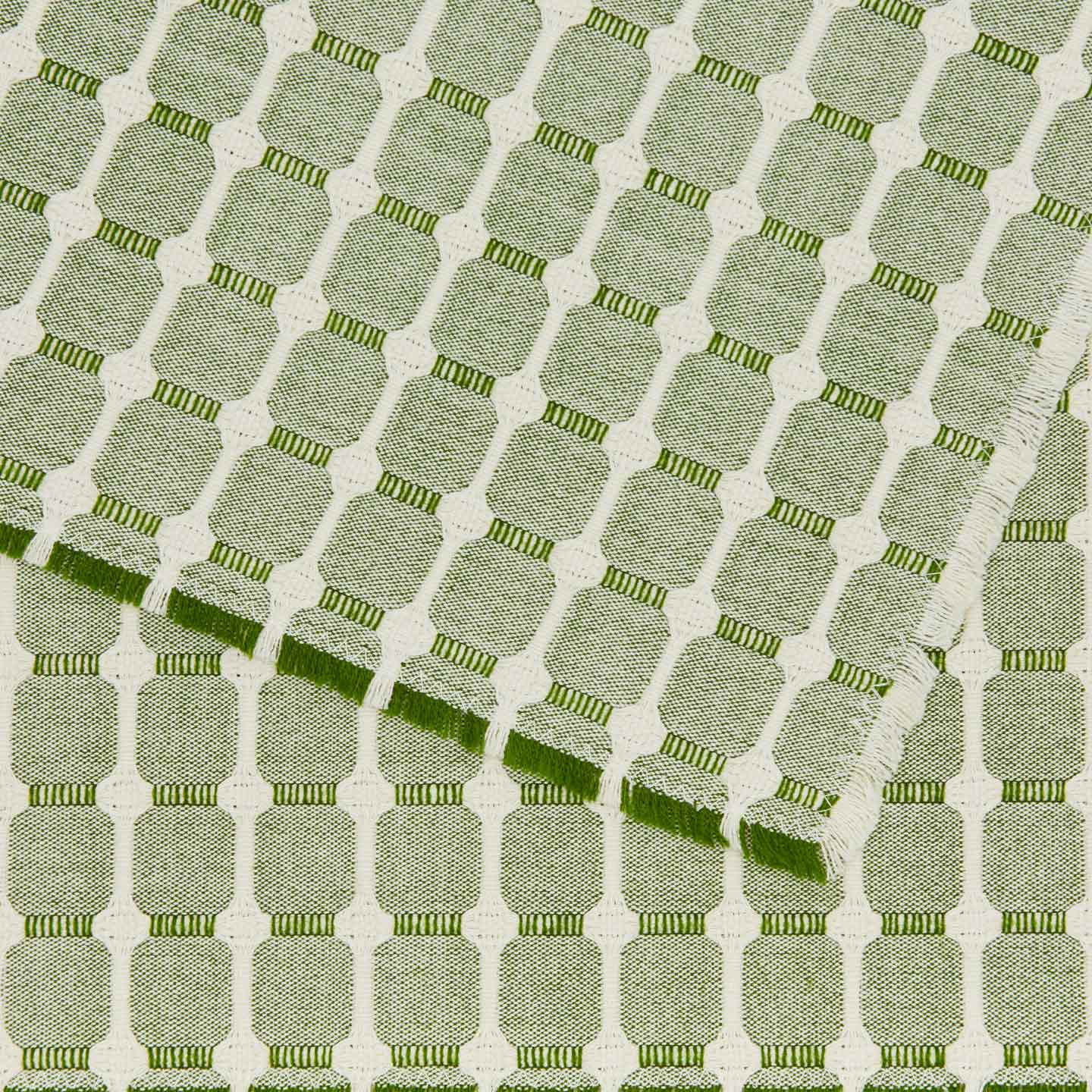 Close up view of Dove and Donkey hopsack placemat in leaf