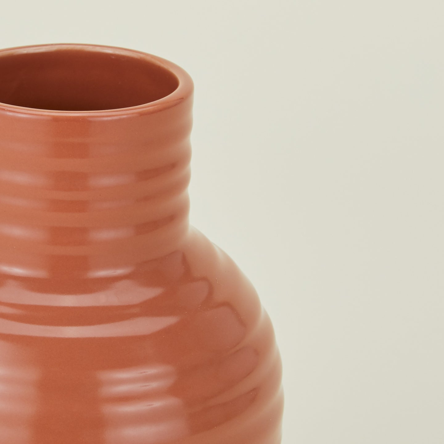 Close up view of essential ceramic vase in terracotta