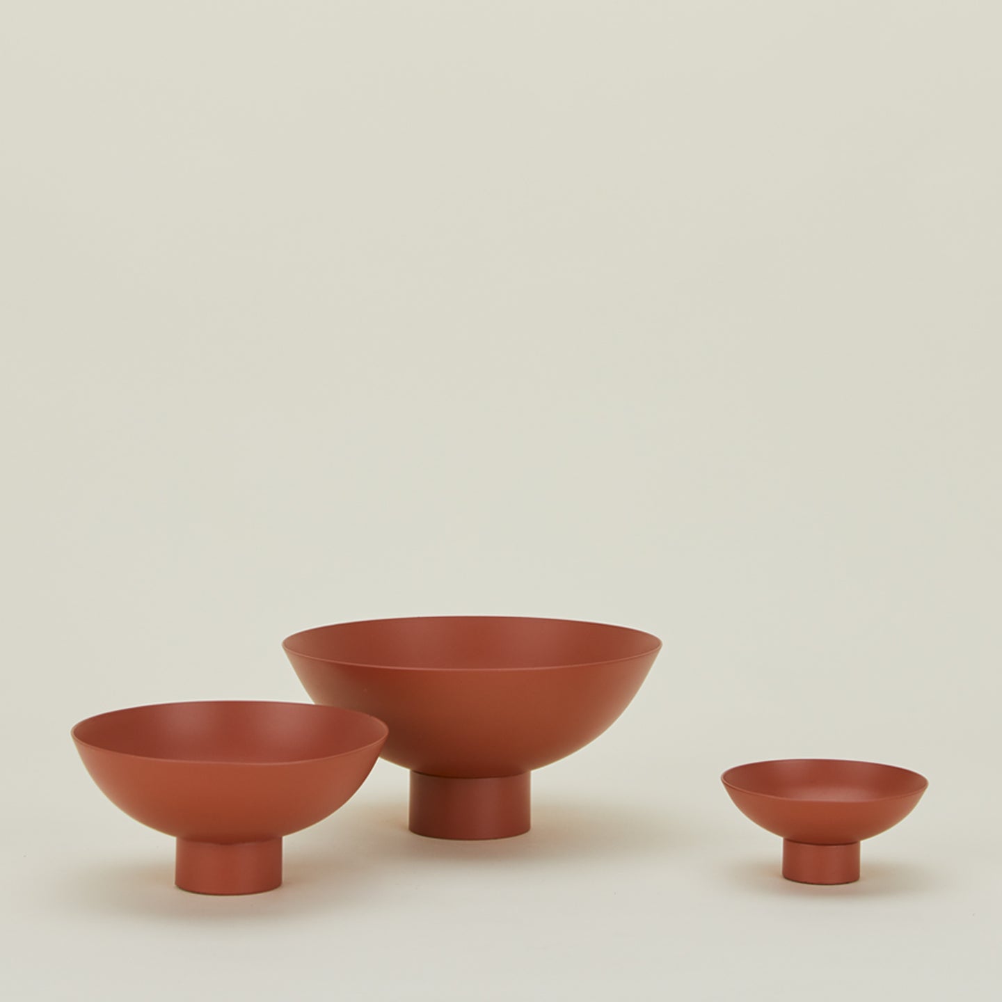 Essential footed bowl family in terracotta