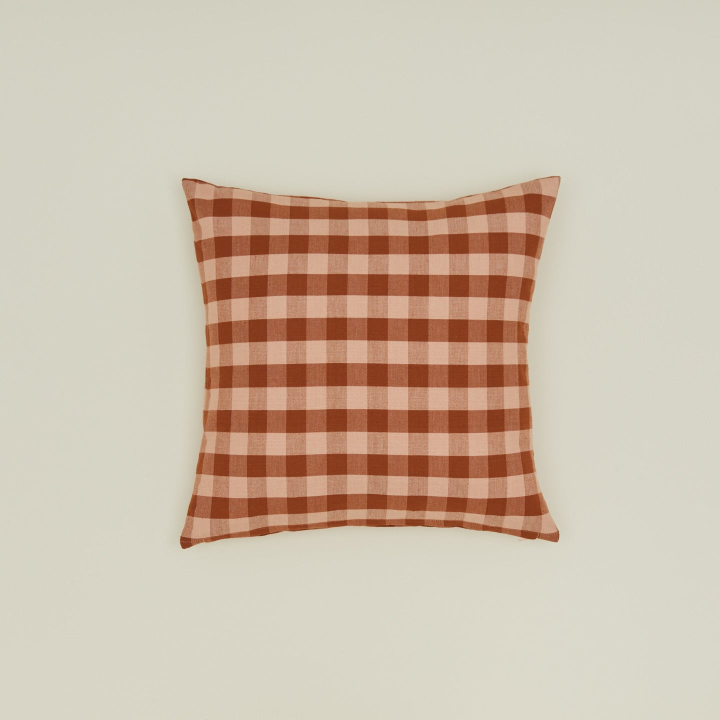 Gingham square pillow in blush/terracotta