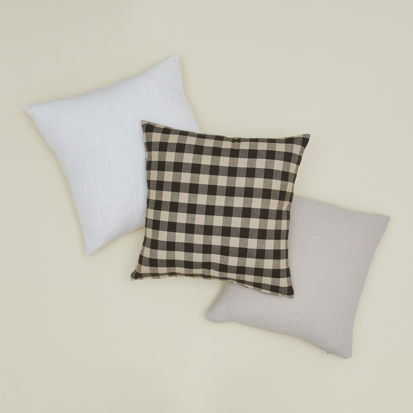 Essential gingham pillow and simple linen pillows in black and white