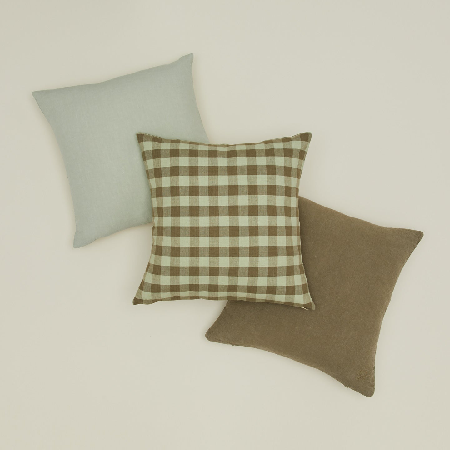 Essential gingham pillow and simple linen pillows in sage and olive