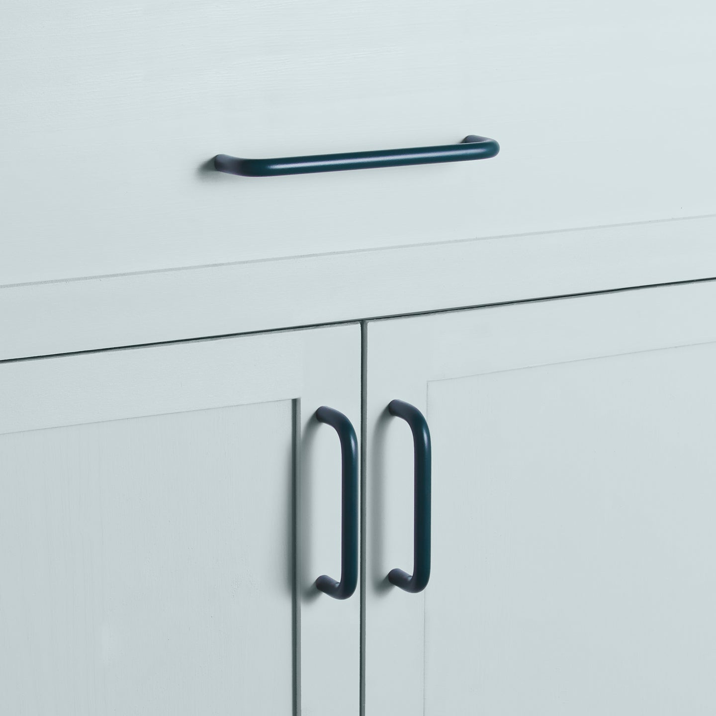 Large and small peacock pulls on drawers and cabinets