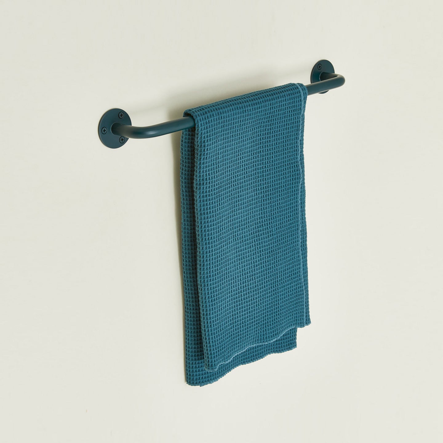 Small towel bar in Dark Peacock with waffle dish towel.