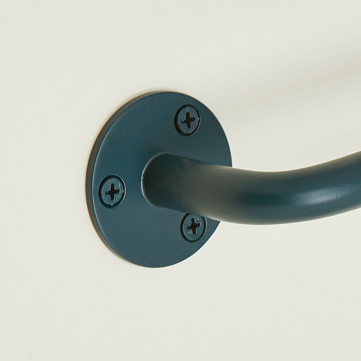 Close up of towel bar in Dark Peacock.