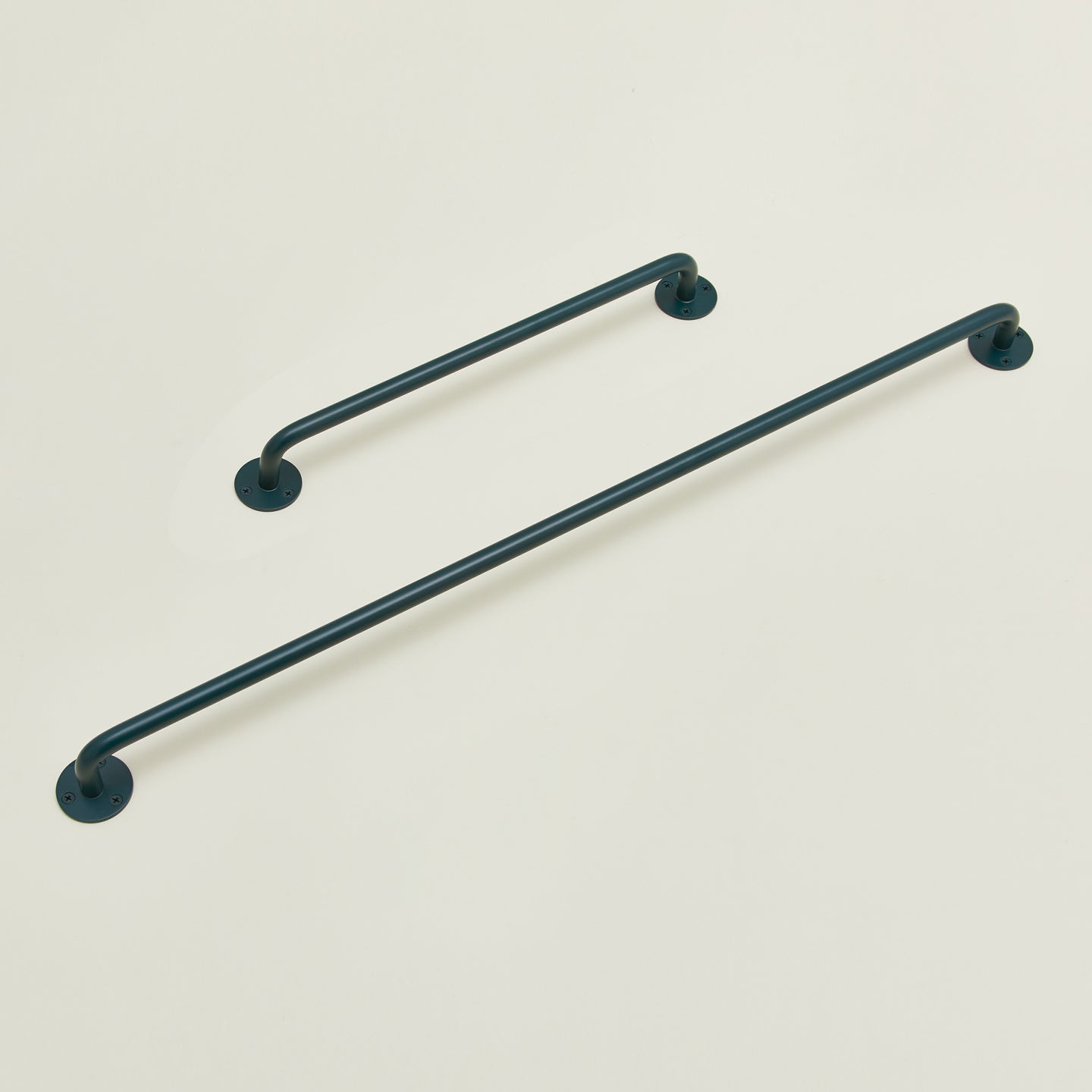 Small and large towel bar in Dark Peacock.