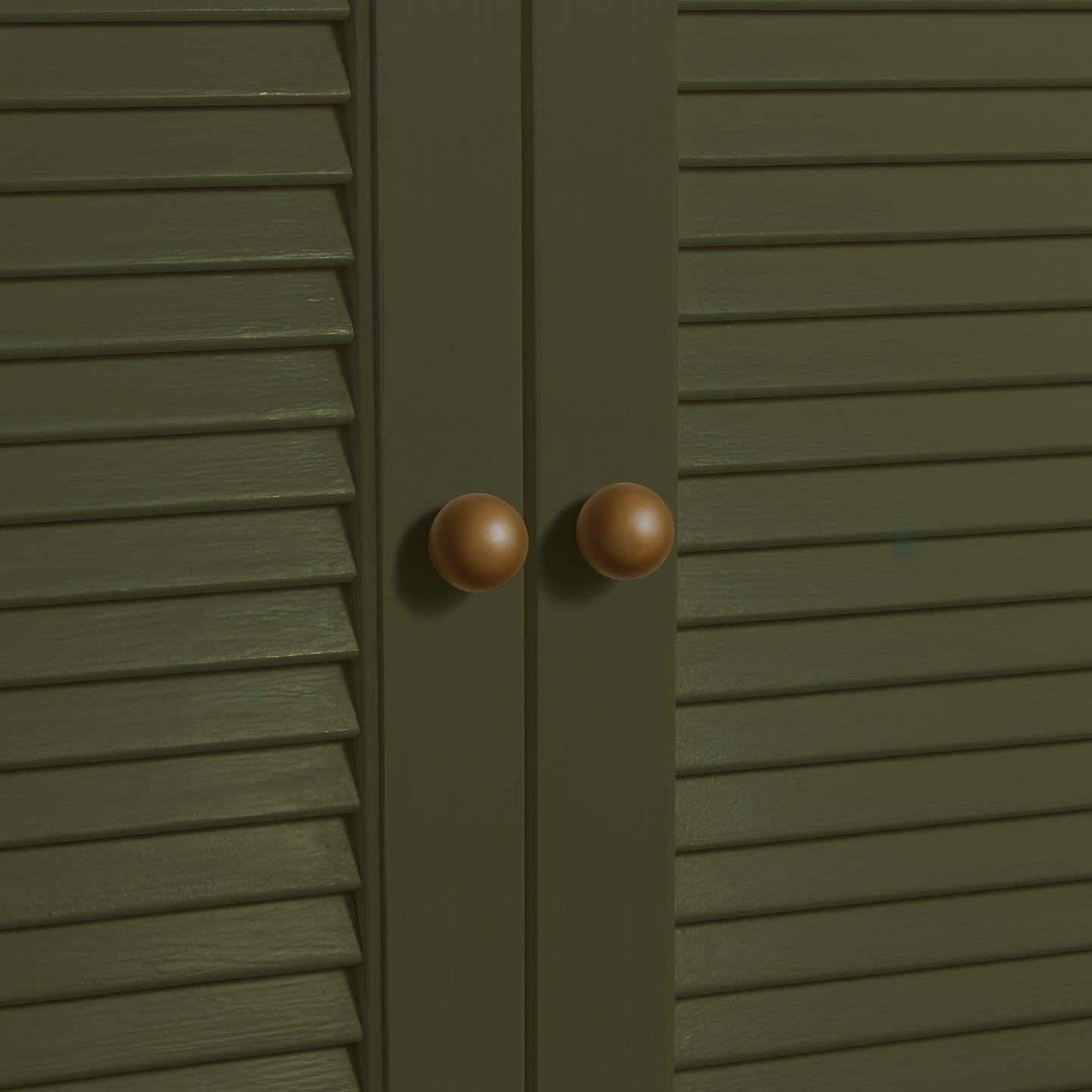 Small olive essential sphere knobs on louvered doors