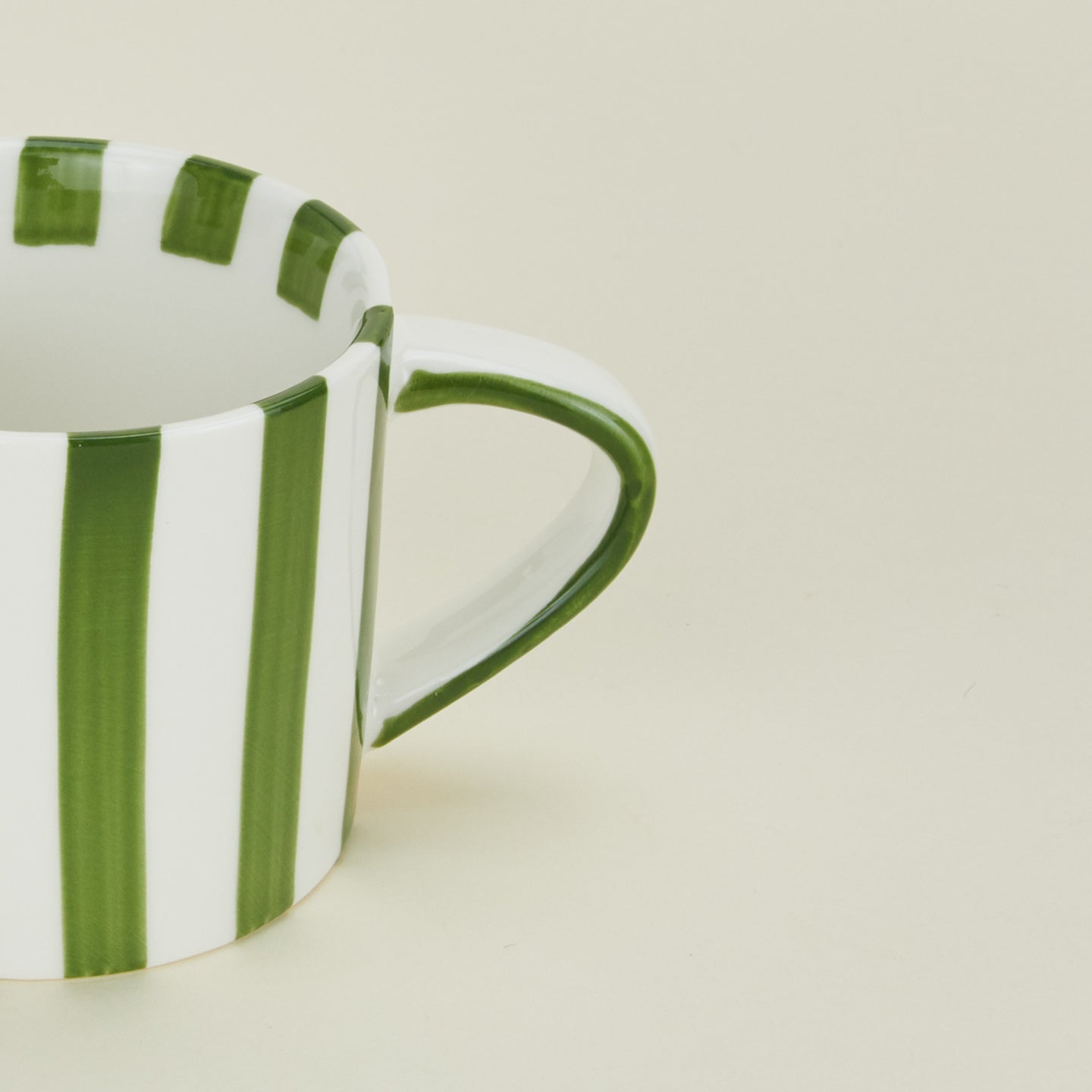 Close up view of Fodory olive striped mug