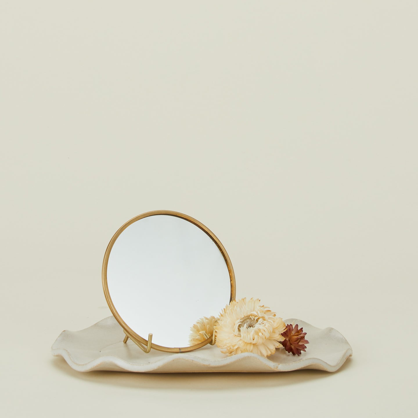 Round brass mirror.