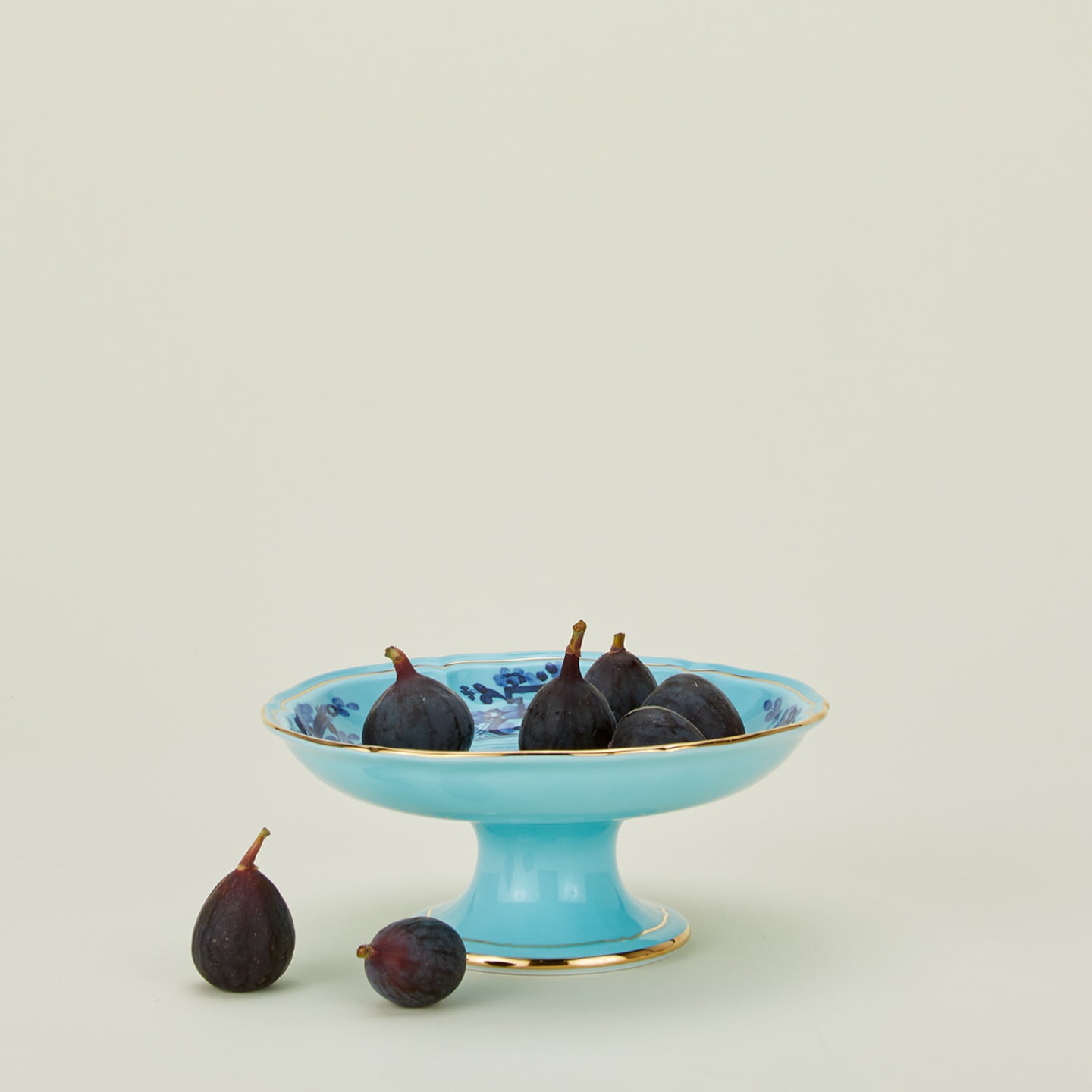 Ginori fruit stand in iris with figs