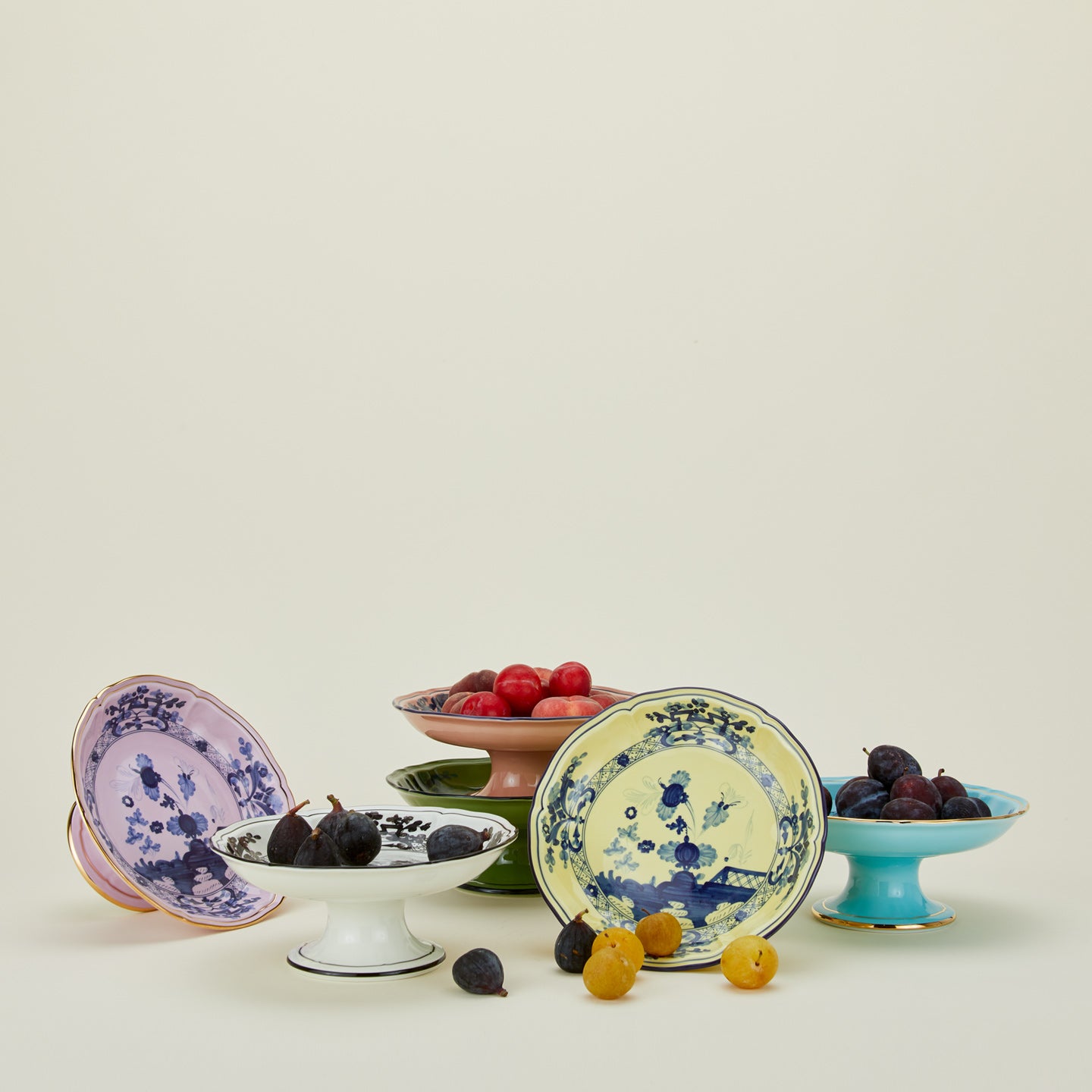 Ginori fruit stands in various colors with fruit
