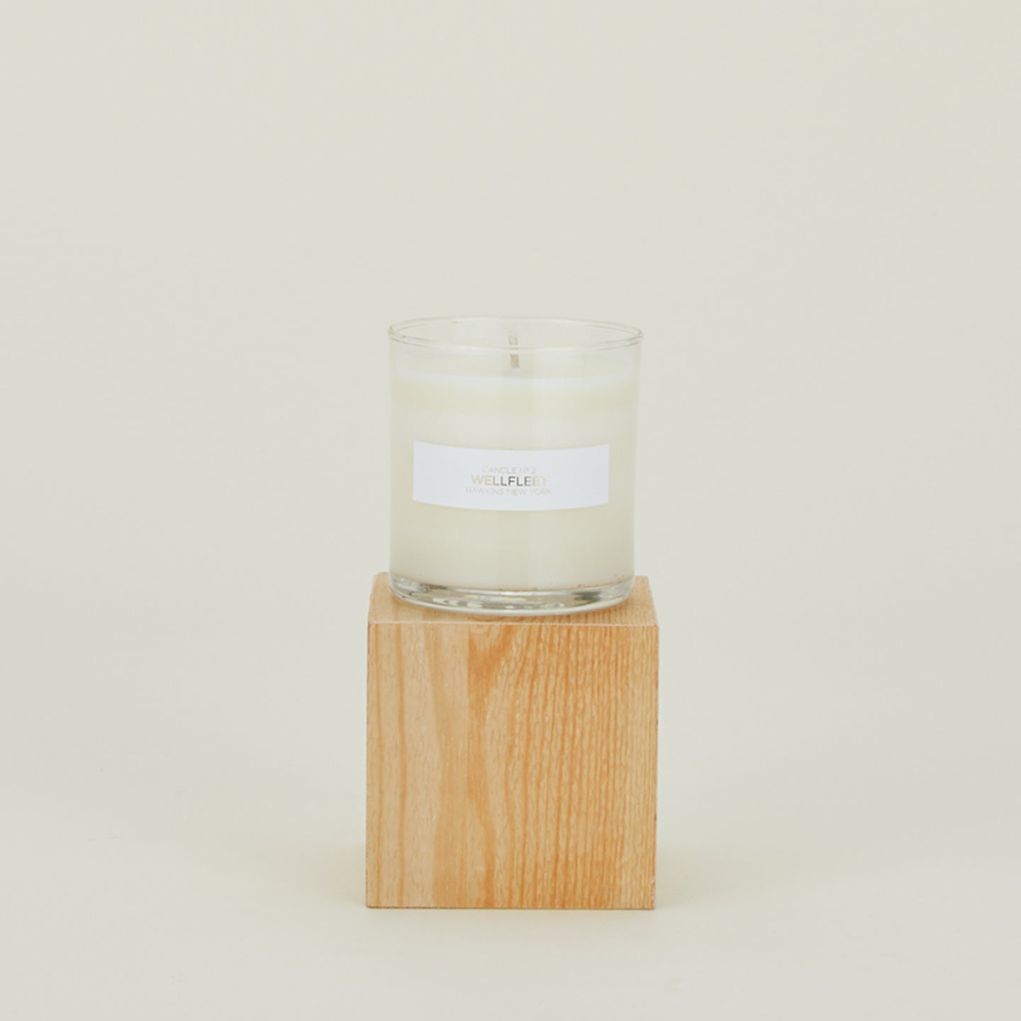Hawkins Wellfleet Candle on wooden block