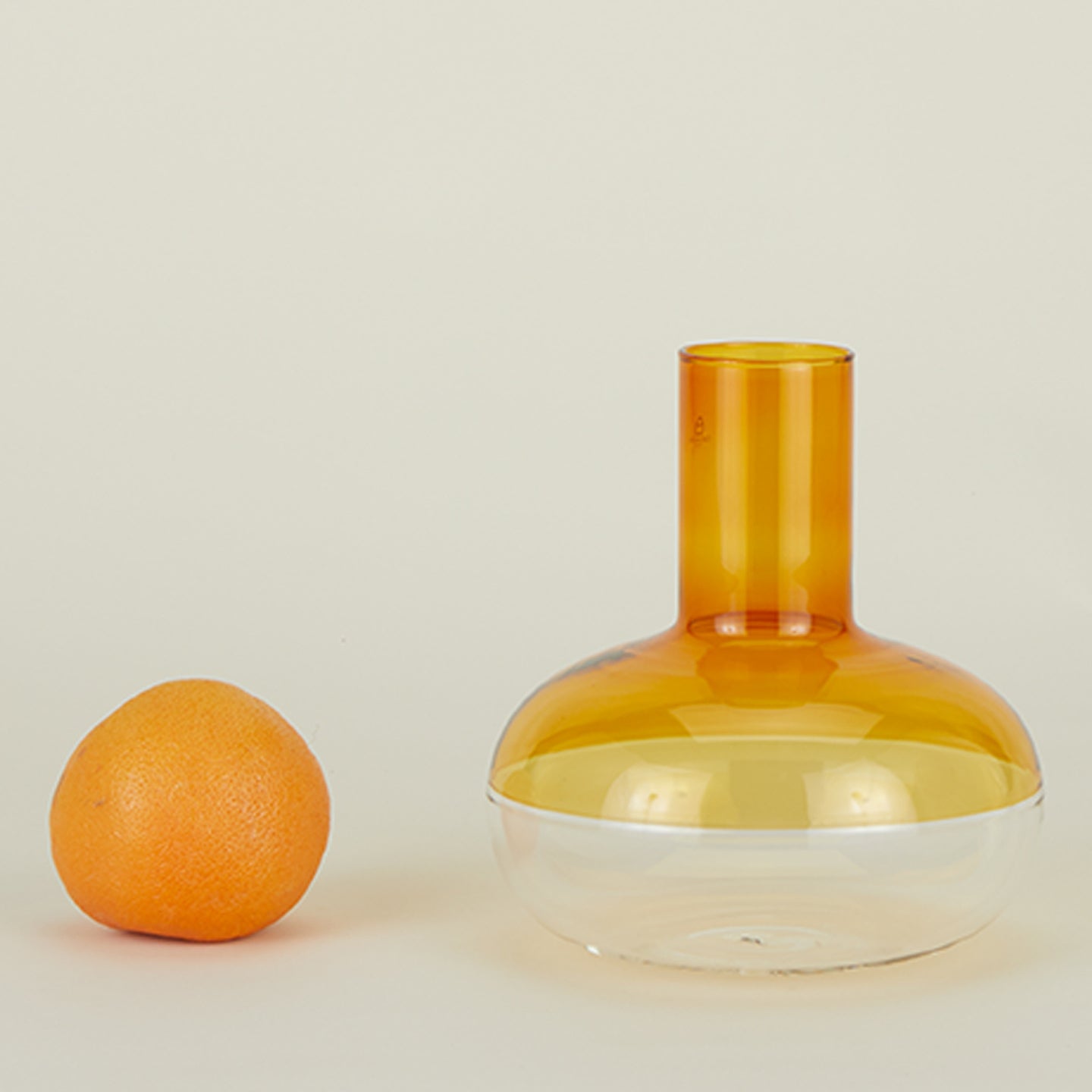 Alchemy Decanter with citrus fruit.