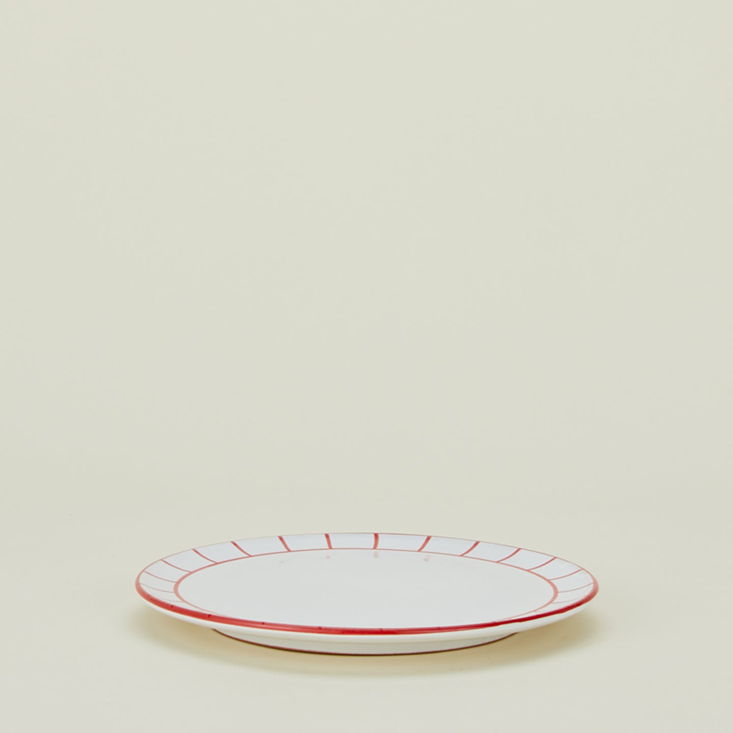 Jore Copenhagen fence edge dinner plate in white.