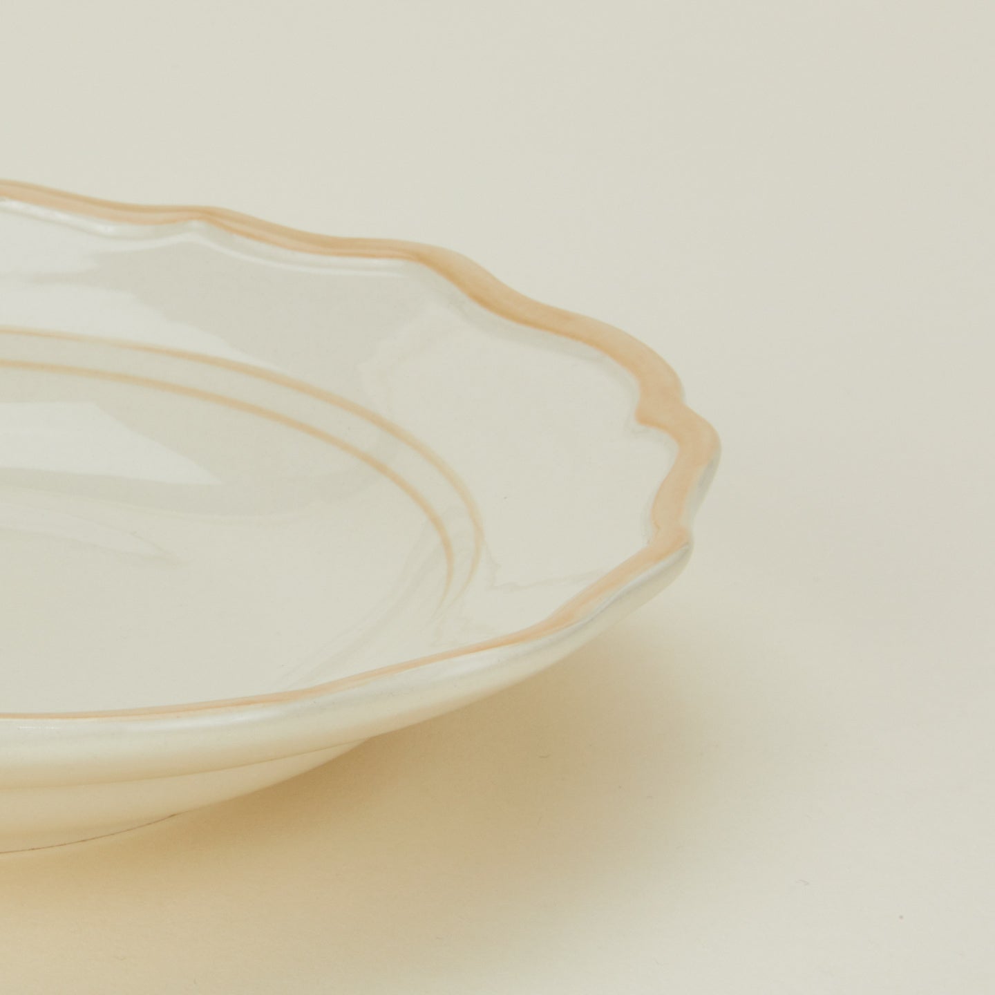 Detailed view of ogee edge pasta bowl