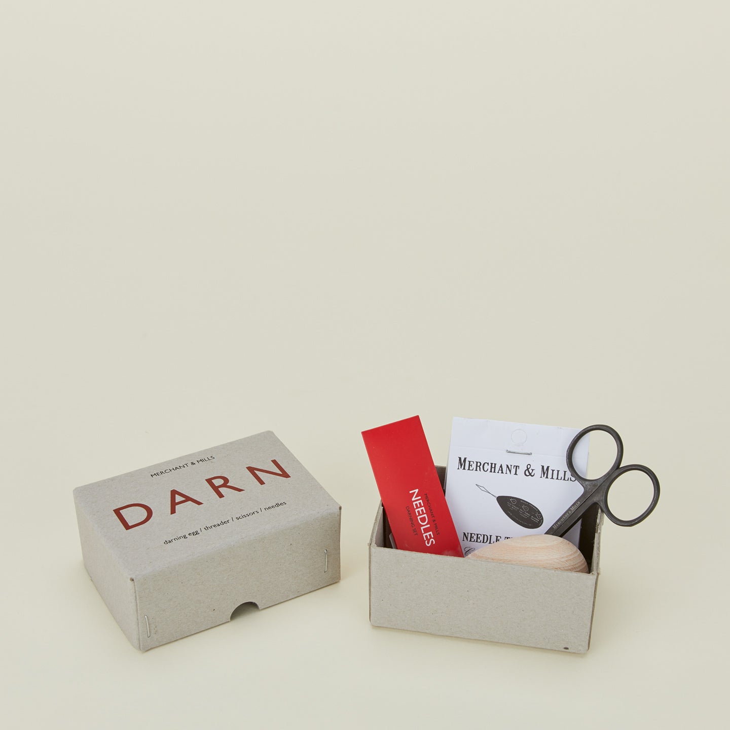 Darn set with needles, scissors, threader, and darning egg
