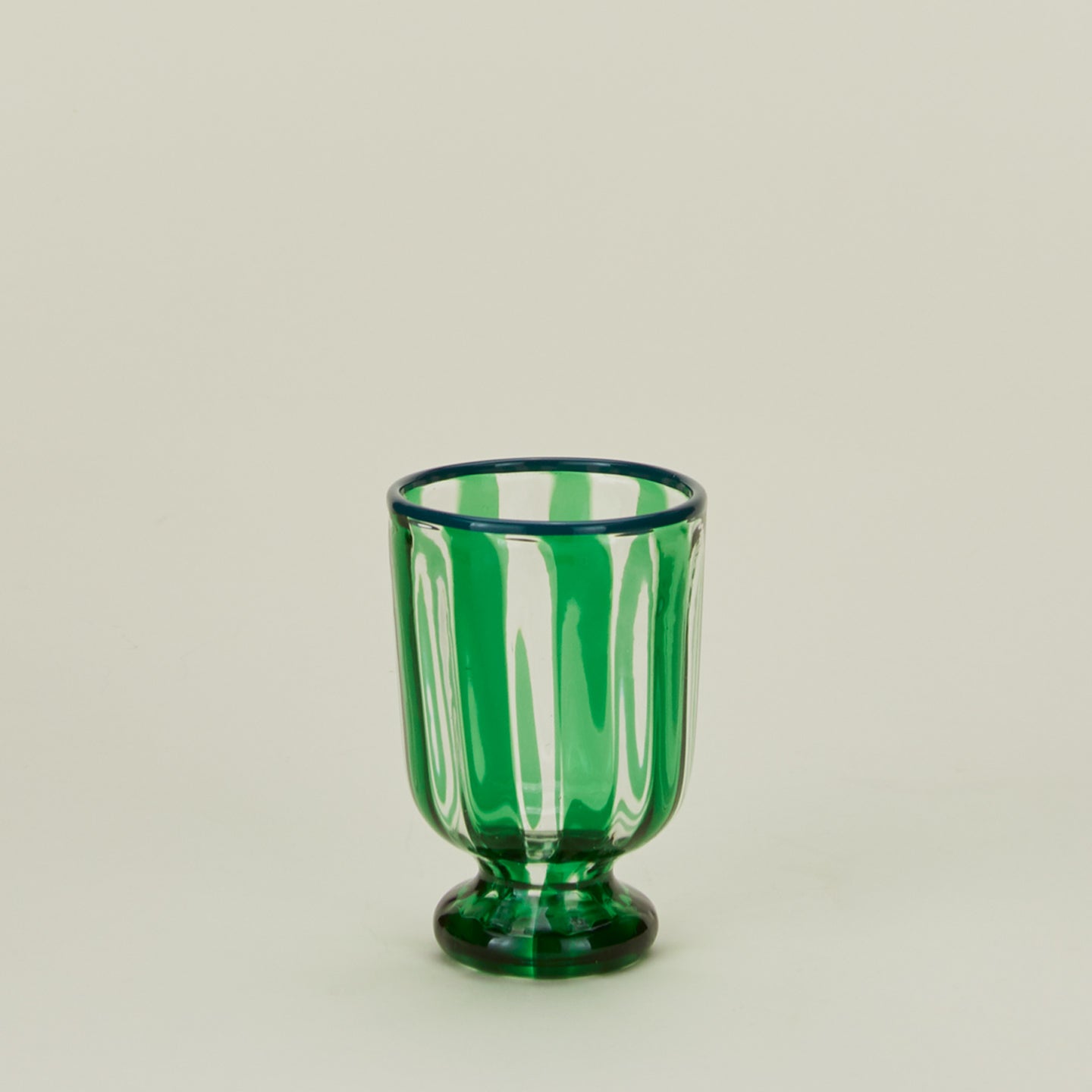 Striped wine glass in green