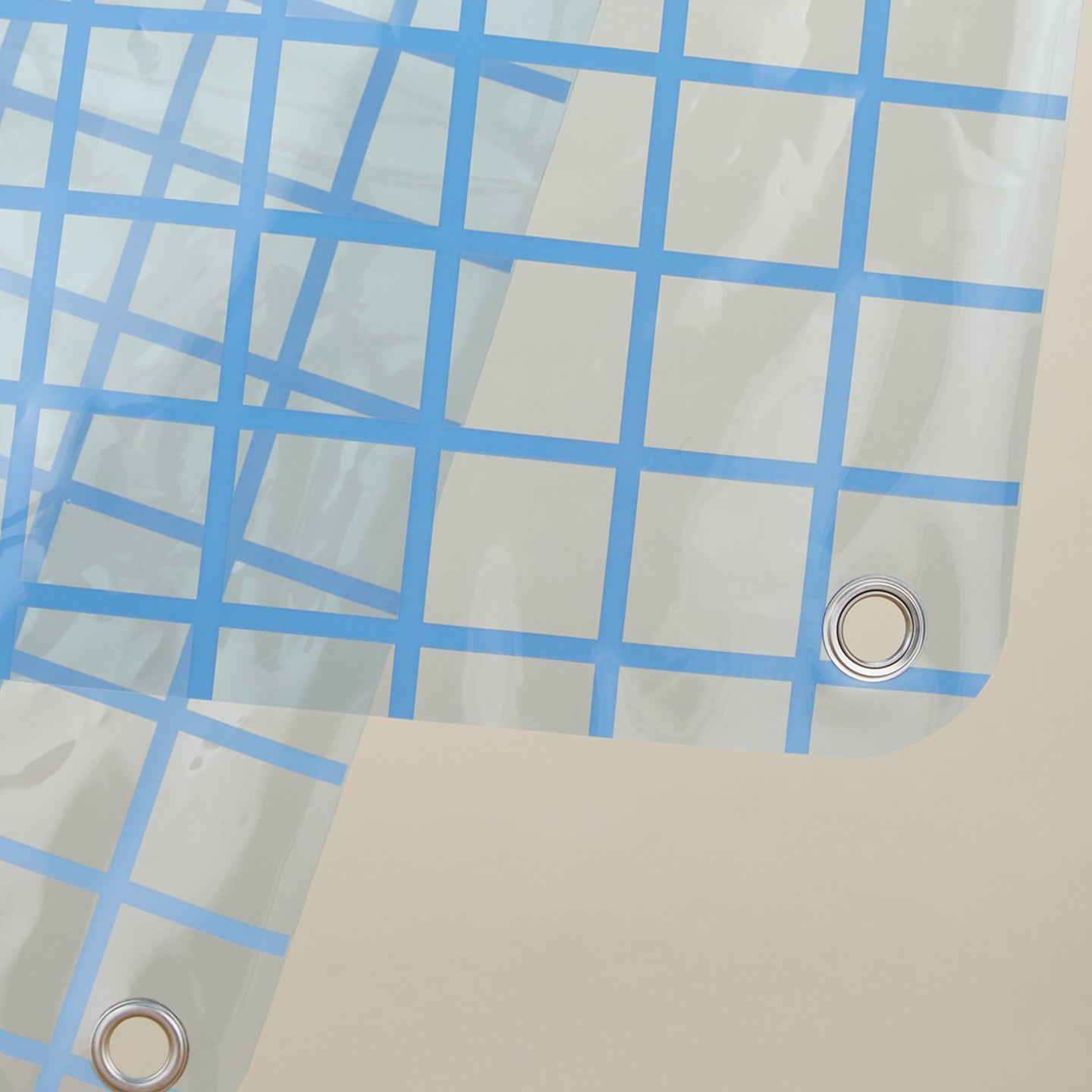 Close up view of atlantic sun grid shower curtain.