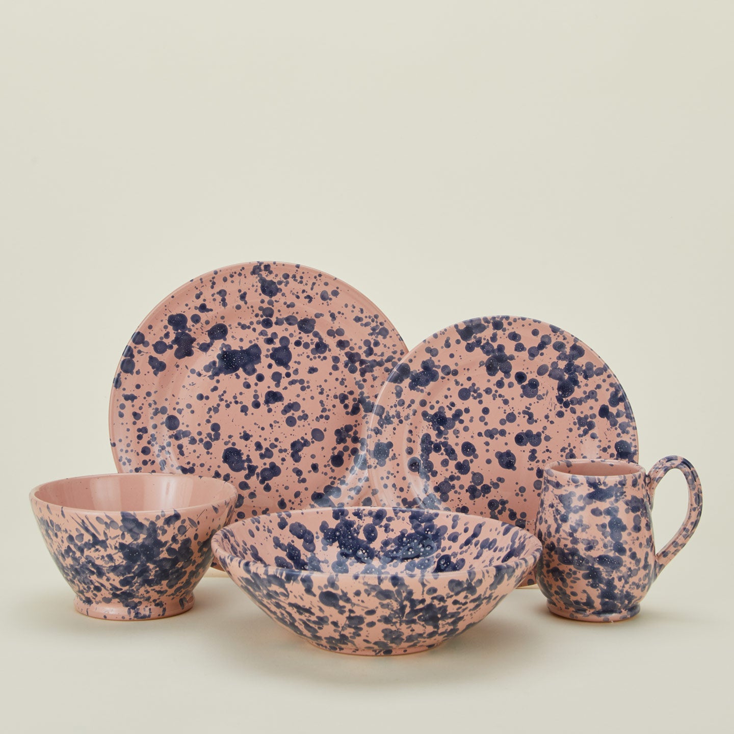 Splatter dinnerware in pink and blue