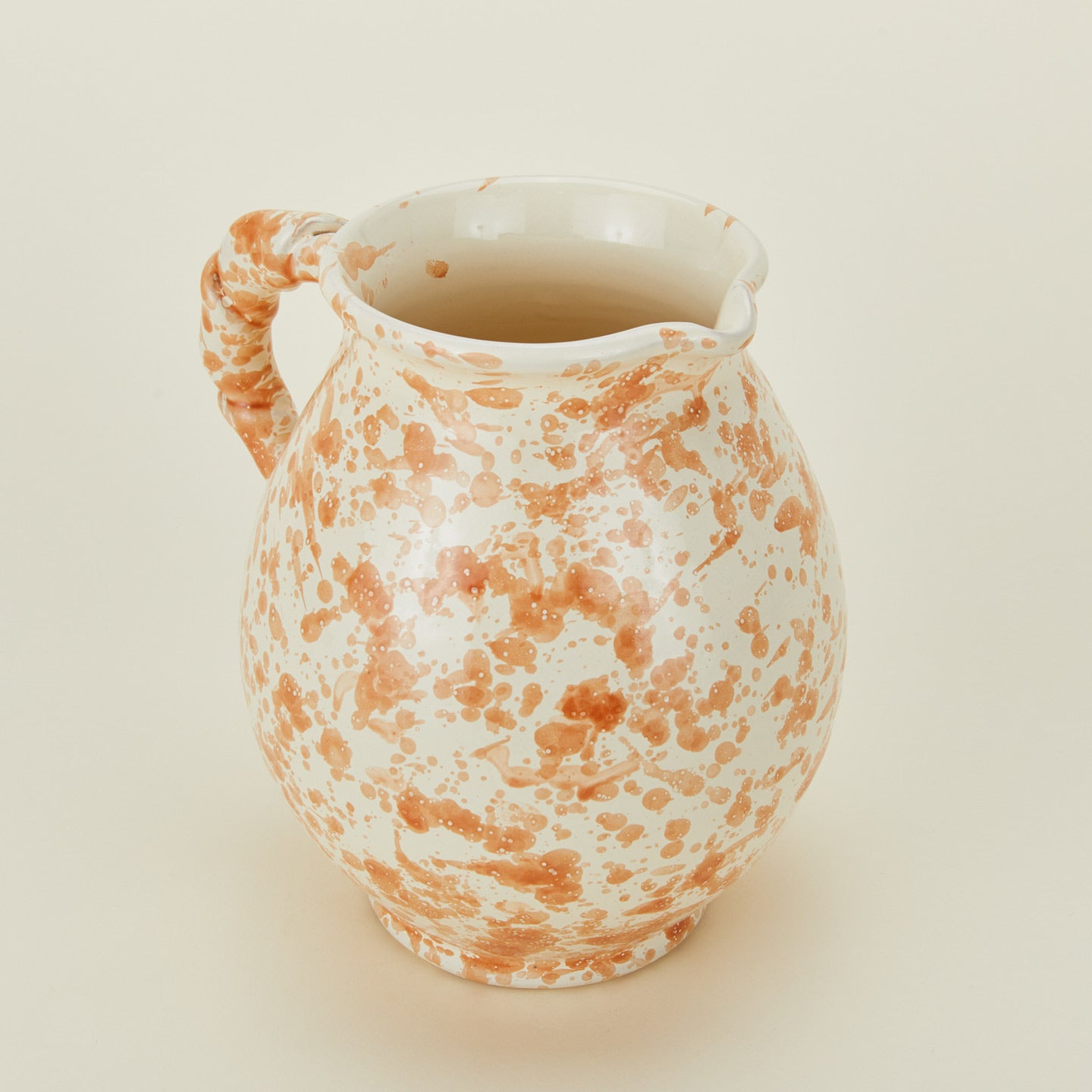 Splatter cigno jug in tan and ivory