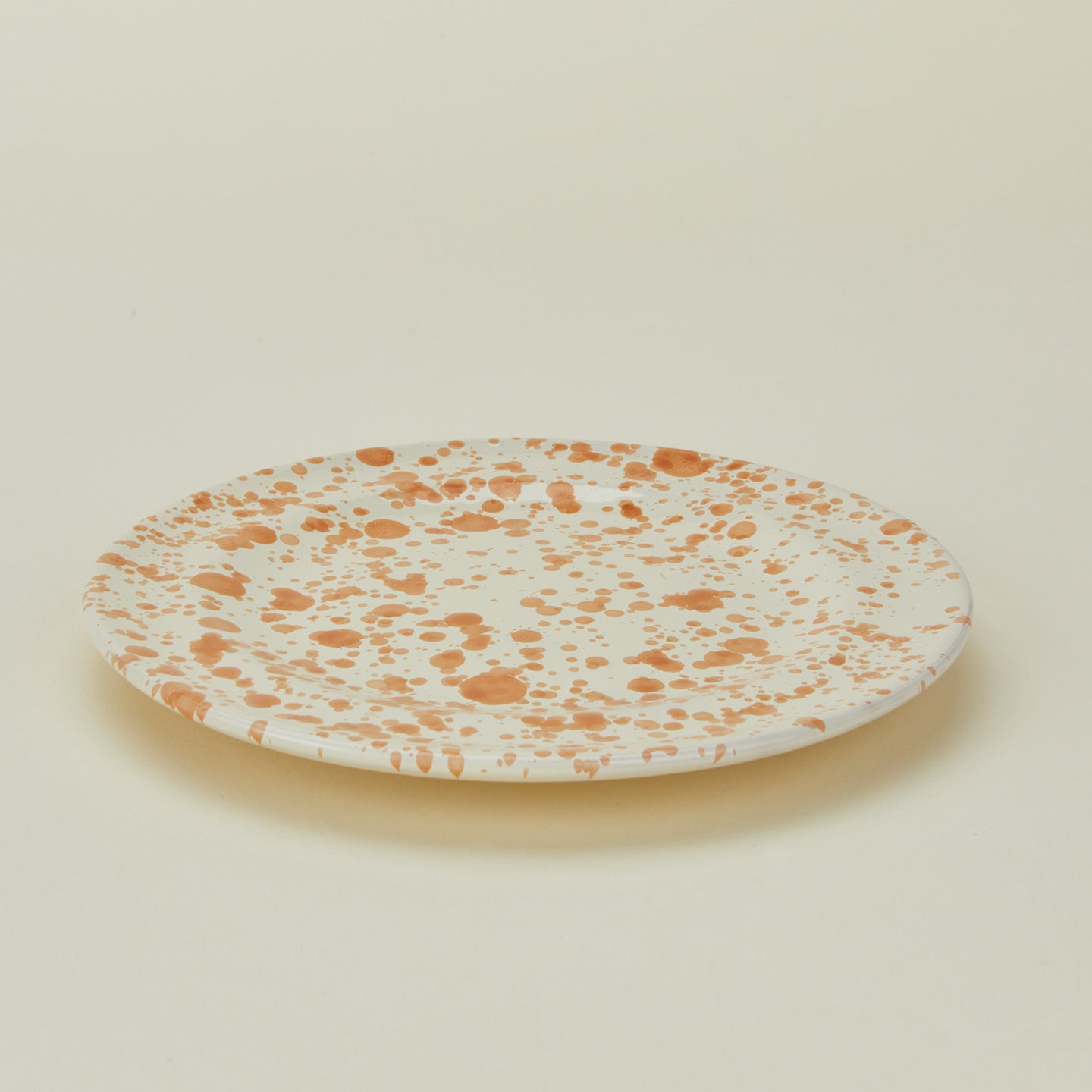 Splatter salad plate in tan and ivory