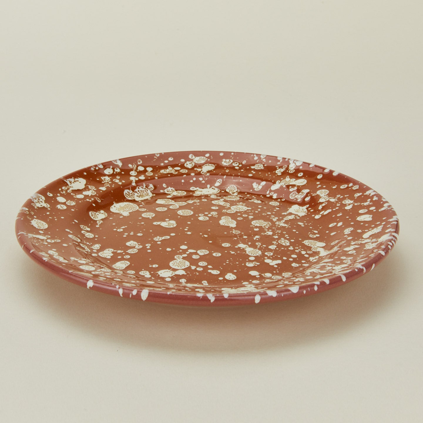 Splatter dinner plate in terracotta and ivory