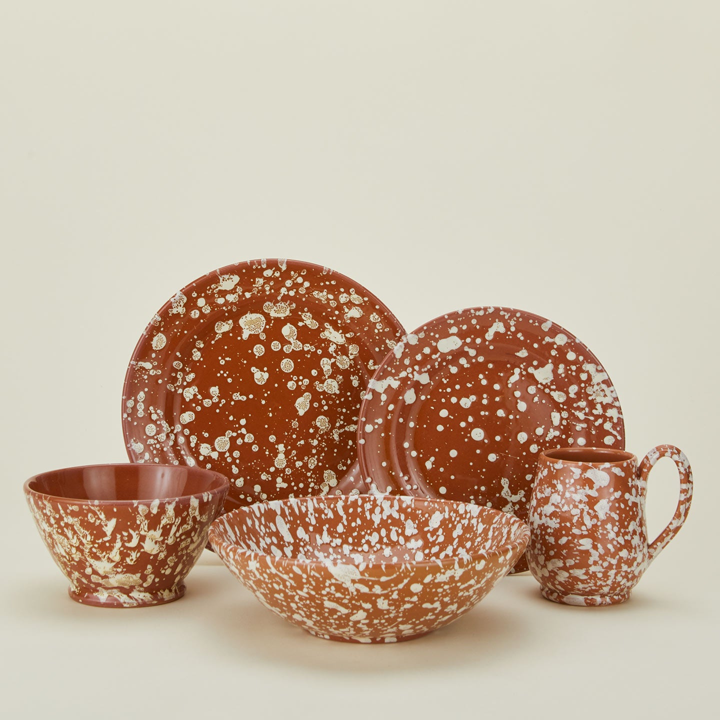 Splatter dinnerware in terracotta and ivory