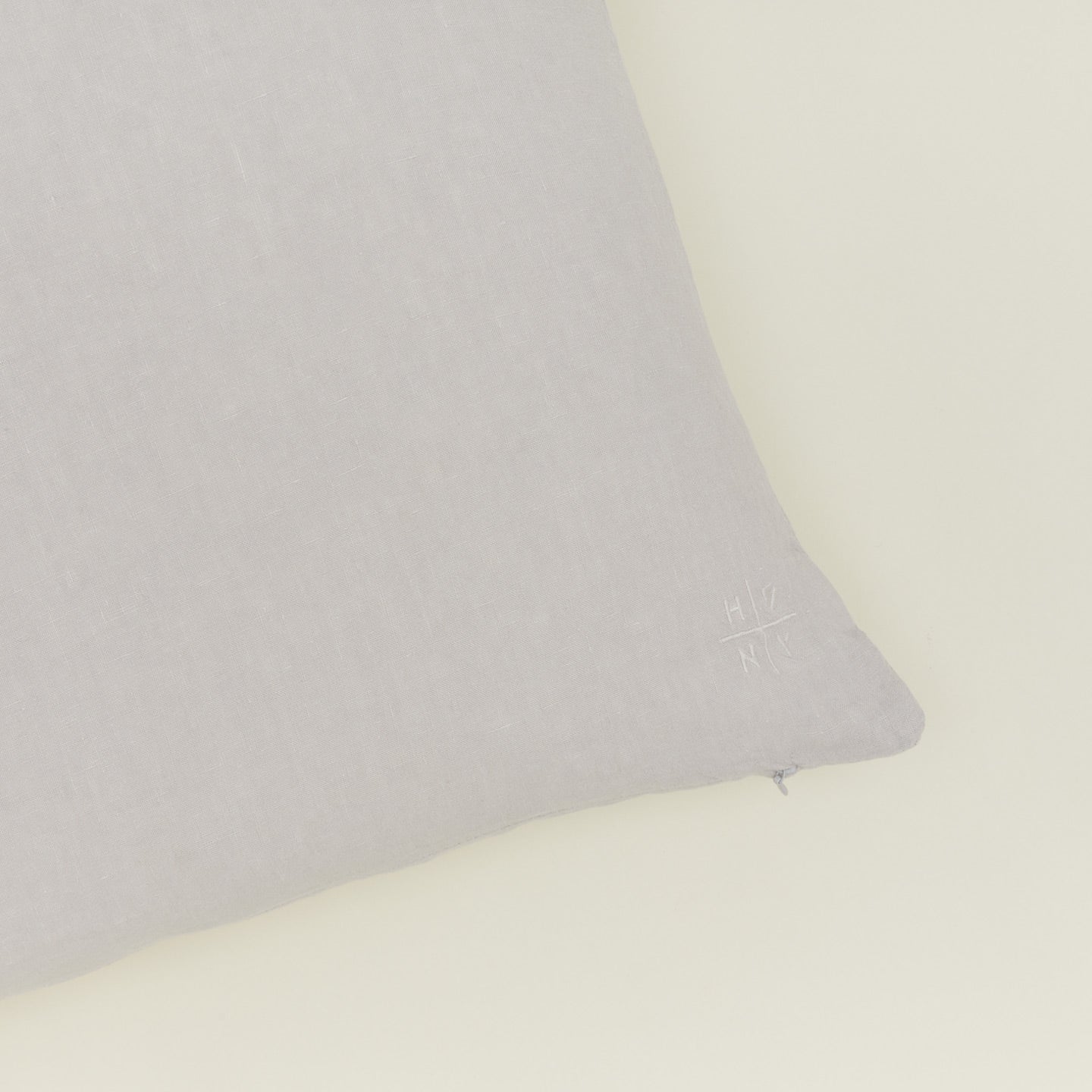 Simple linen pillow in light grey