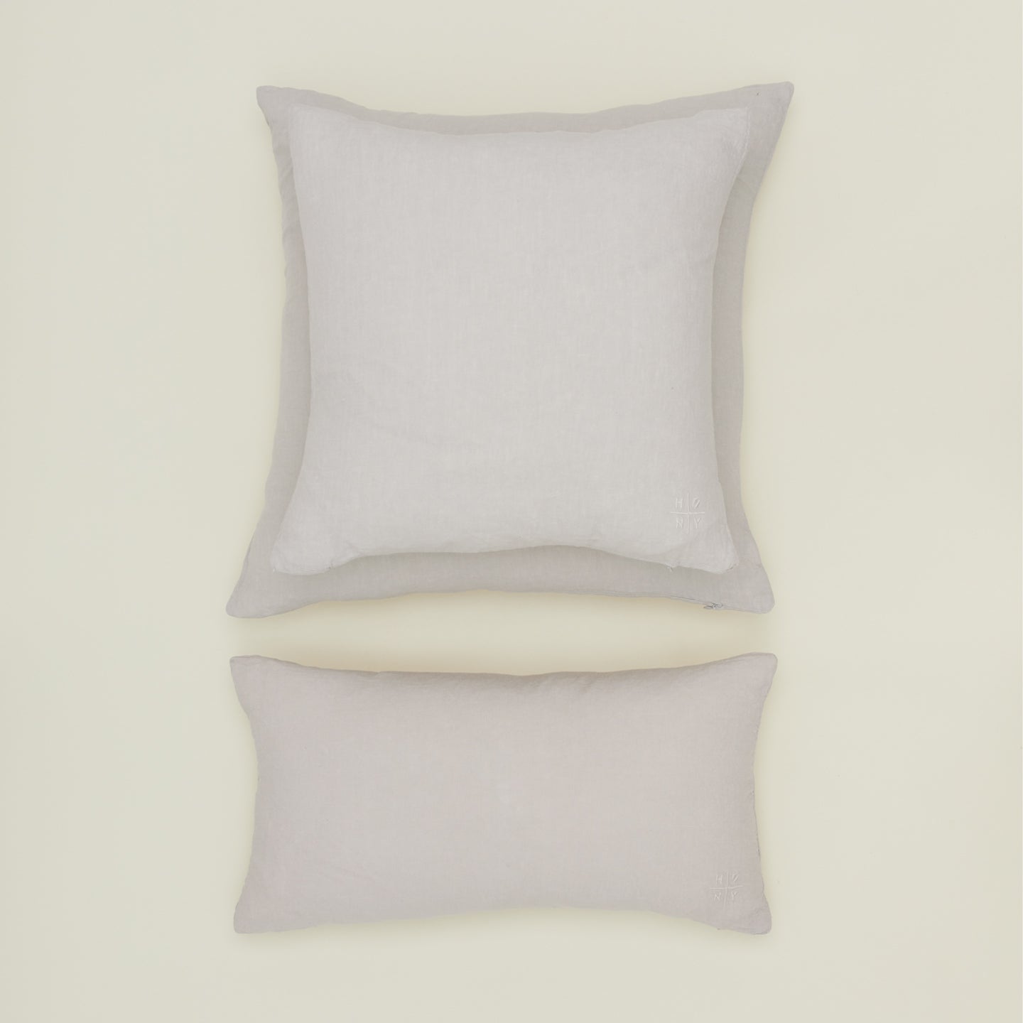 Simple linen pillow in light grey