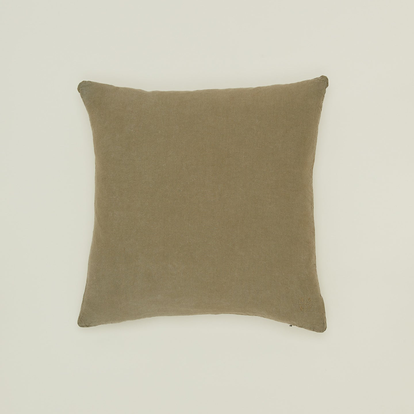 Simple linen pillow in olive